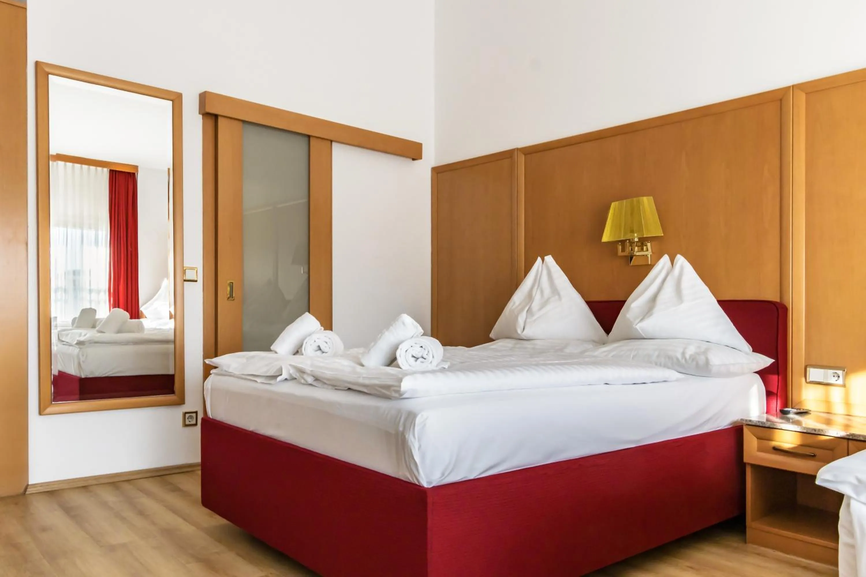 Bed in Hotel Corvinus Vienna