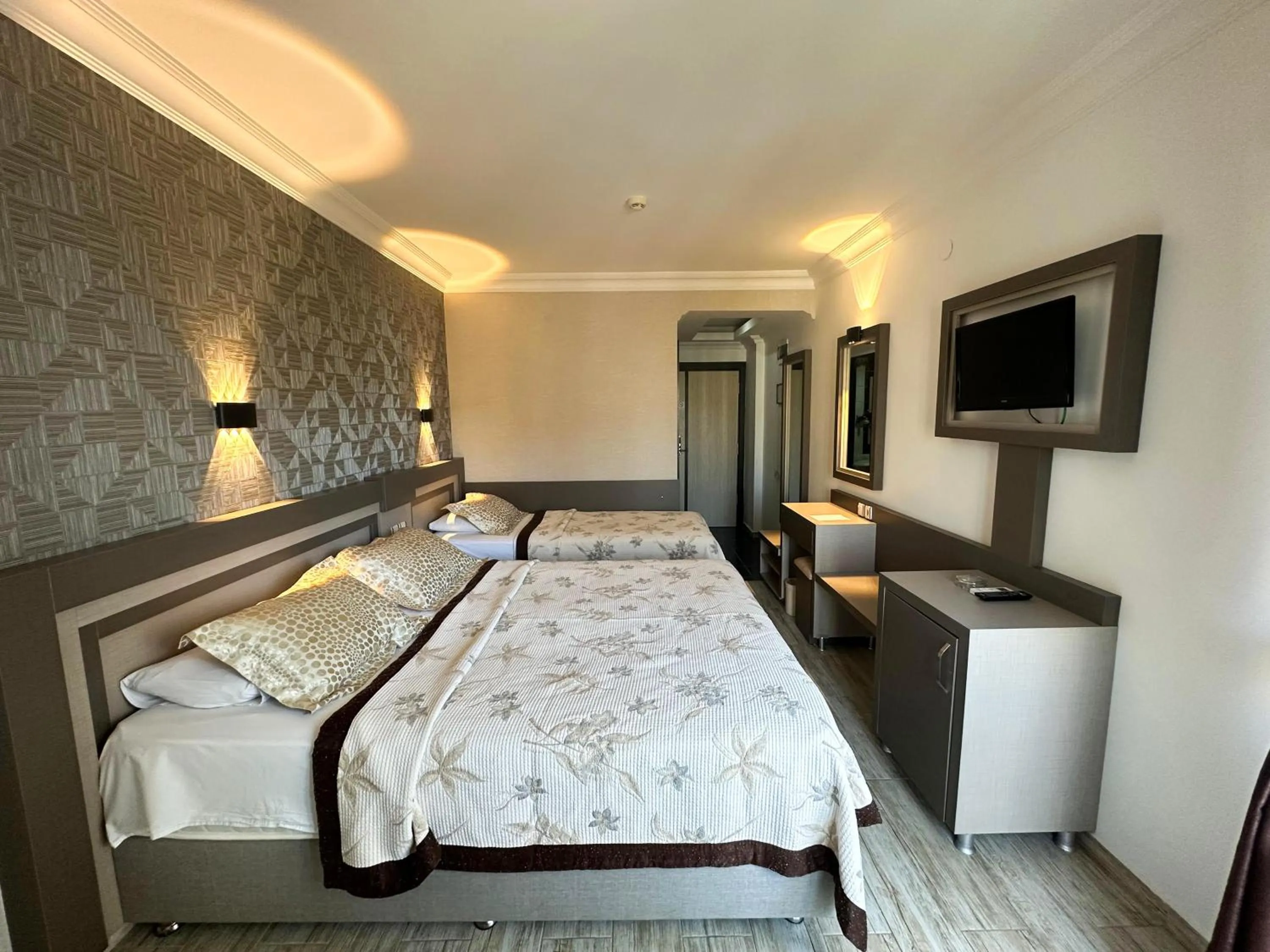 Bed in Monte Carlo Hotel