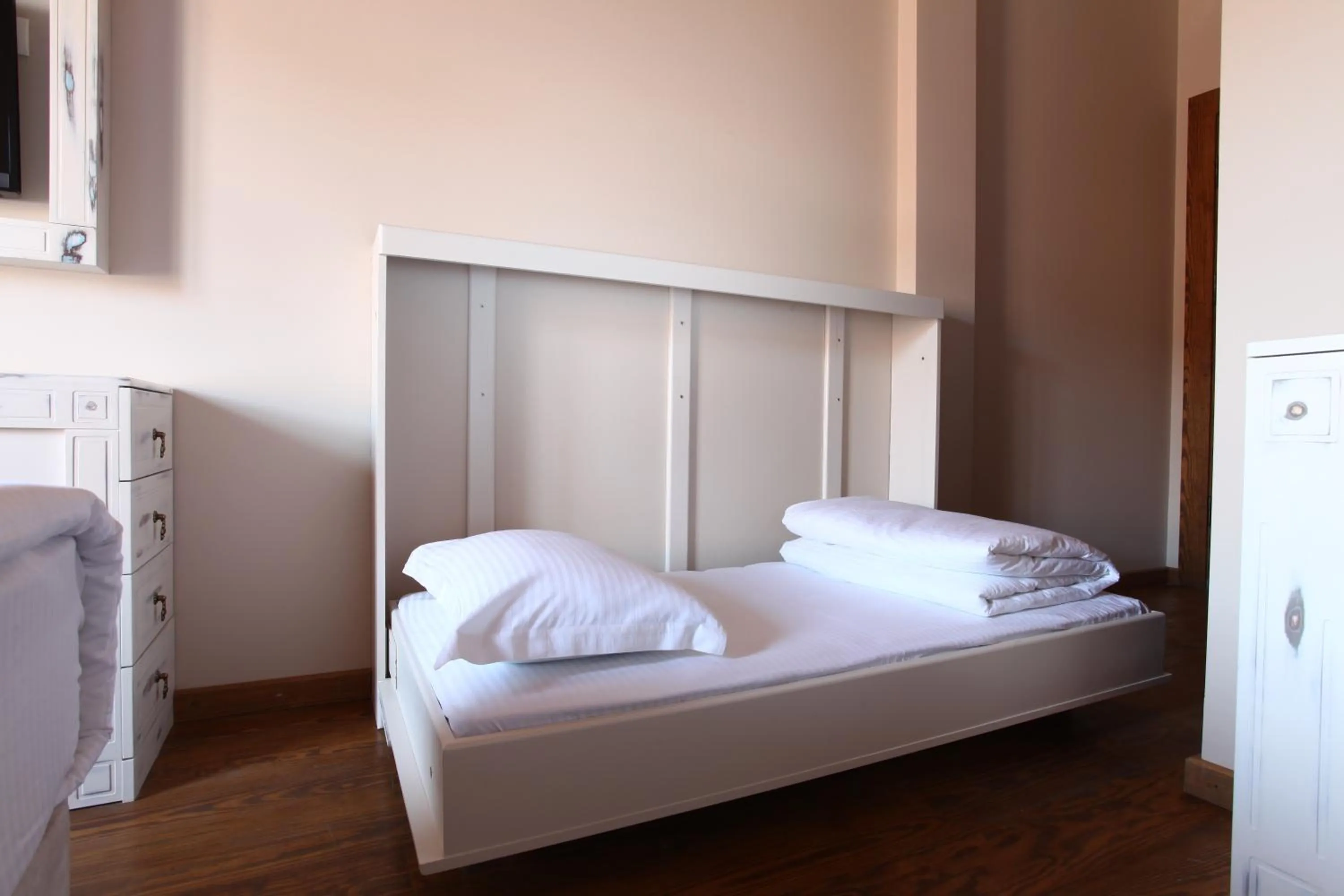 Decorative detail, Bed in Orchis Hotel