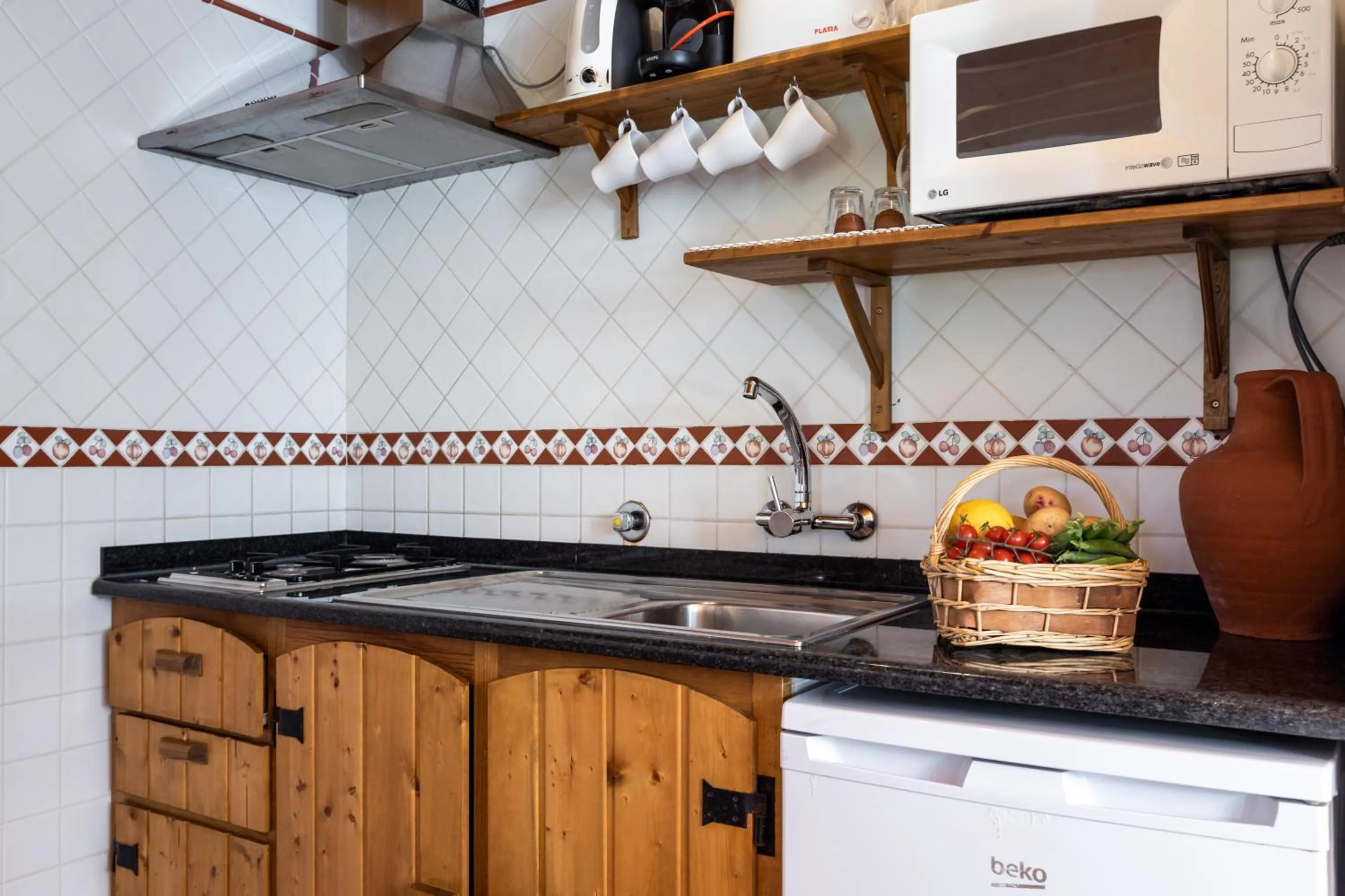 Kitchen or kitchenette in Monte Das Alpenduradas