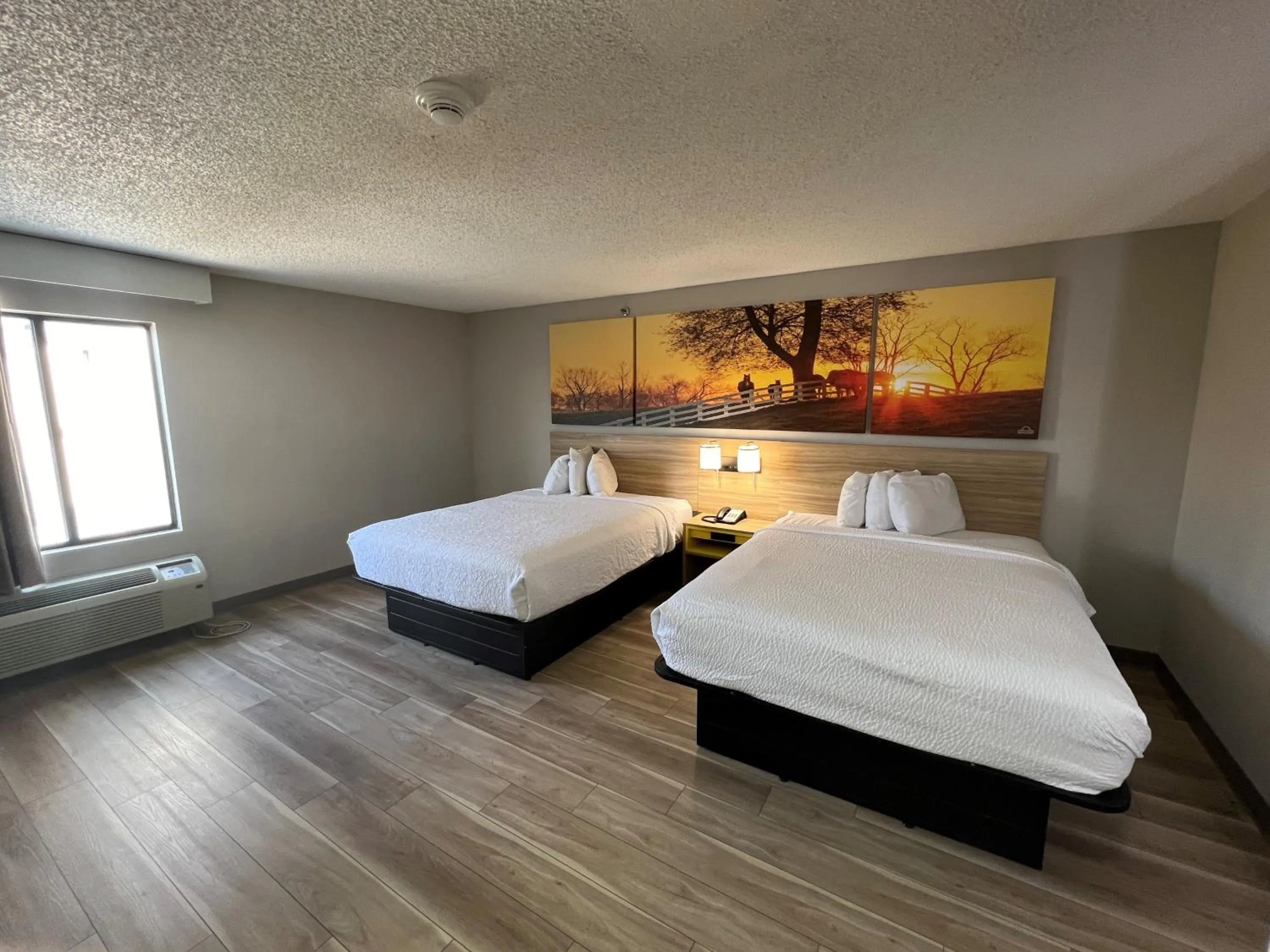 Bed in Days Inn by Wyndham Tulsa Central
