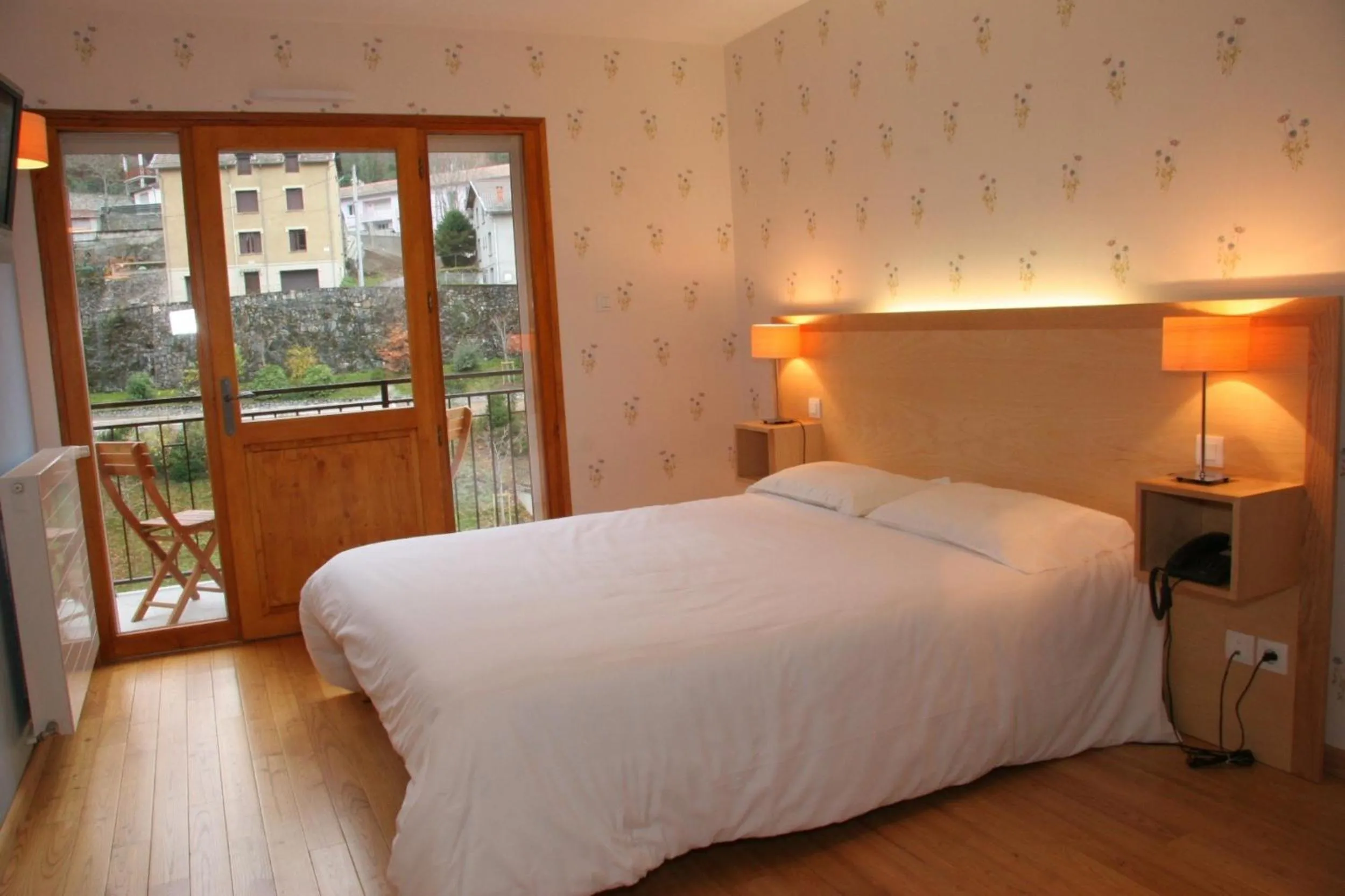 Photo of the whole room, Bed in Hôtel Le Chalet