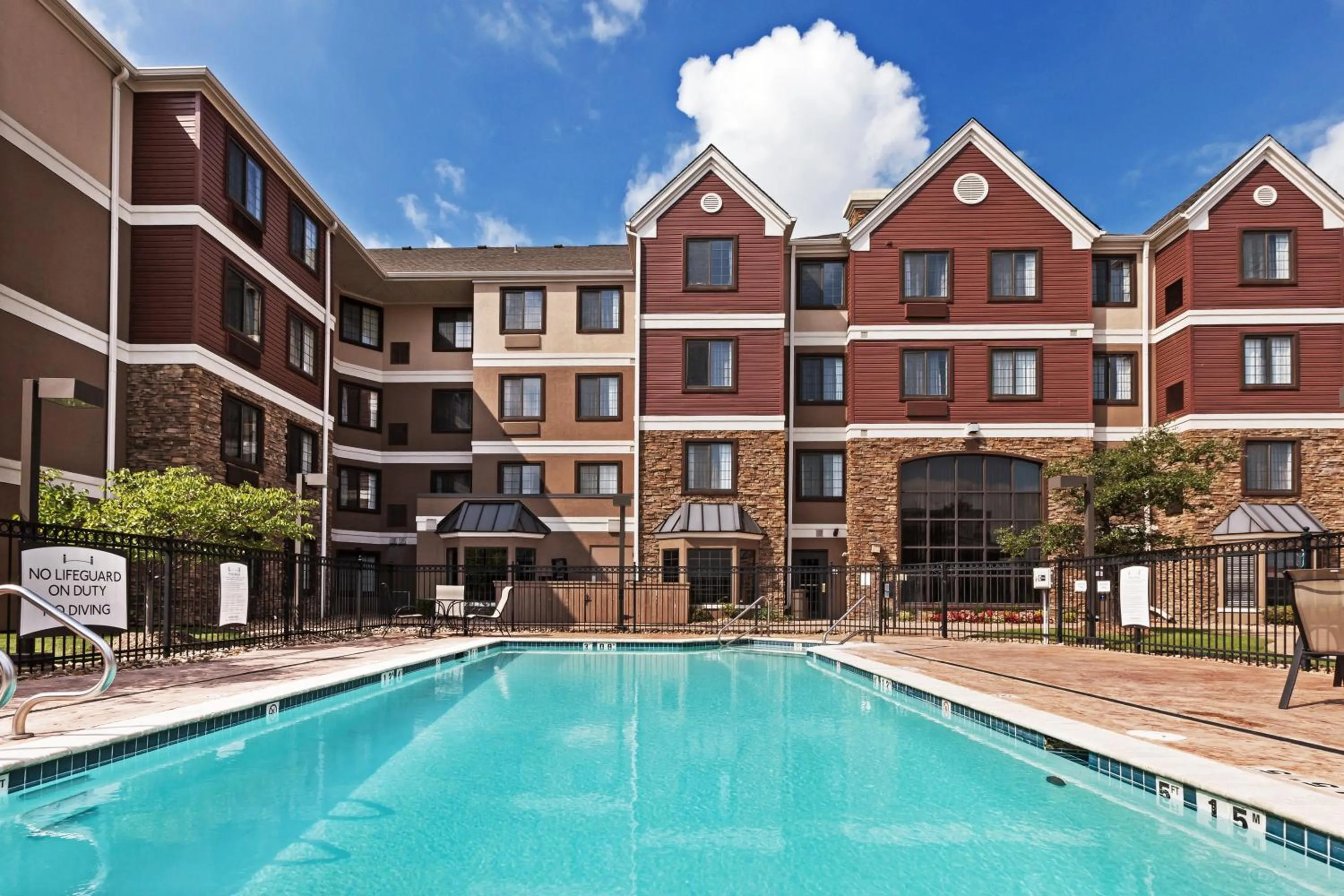 Swimming pool in Staybridge Suites Tulsa-Woodland Hills, an IHG Hotel