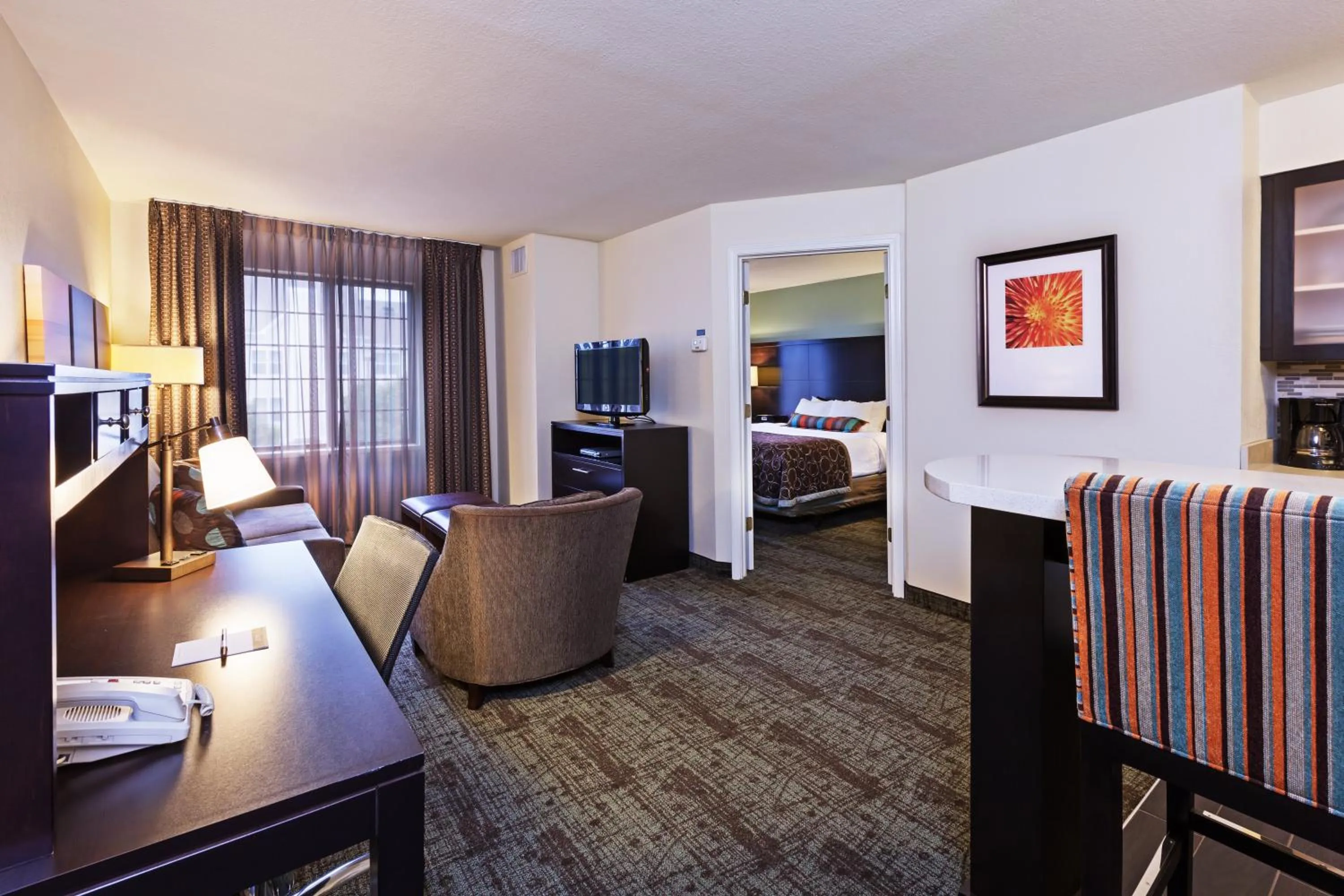 Photo of the whole room, Bed in Staybridge Suites Tulsa-Woodland Hills, an IHG Hotel