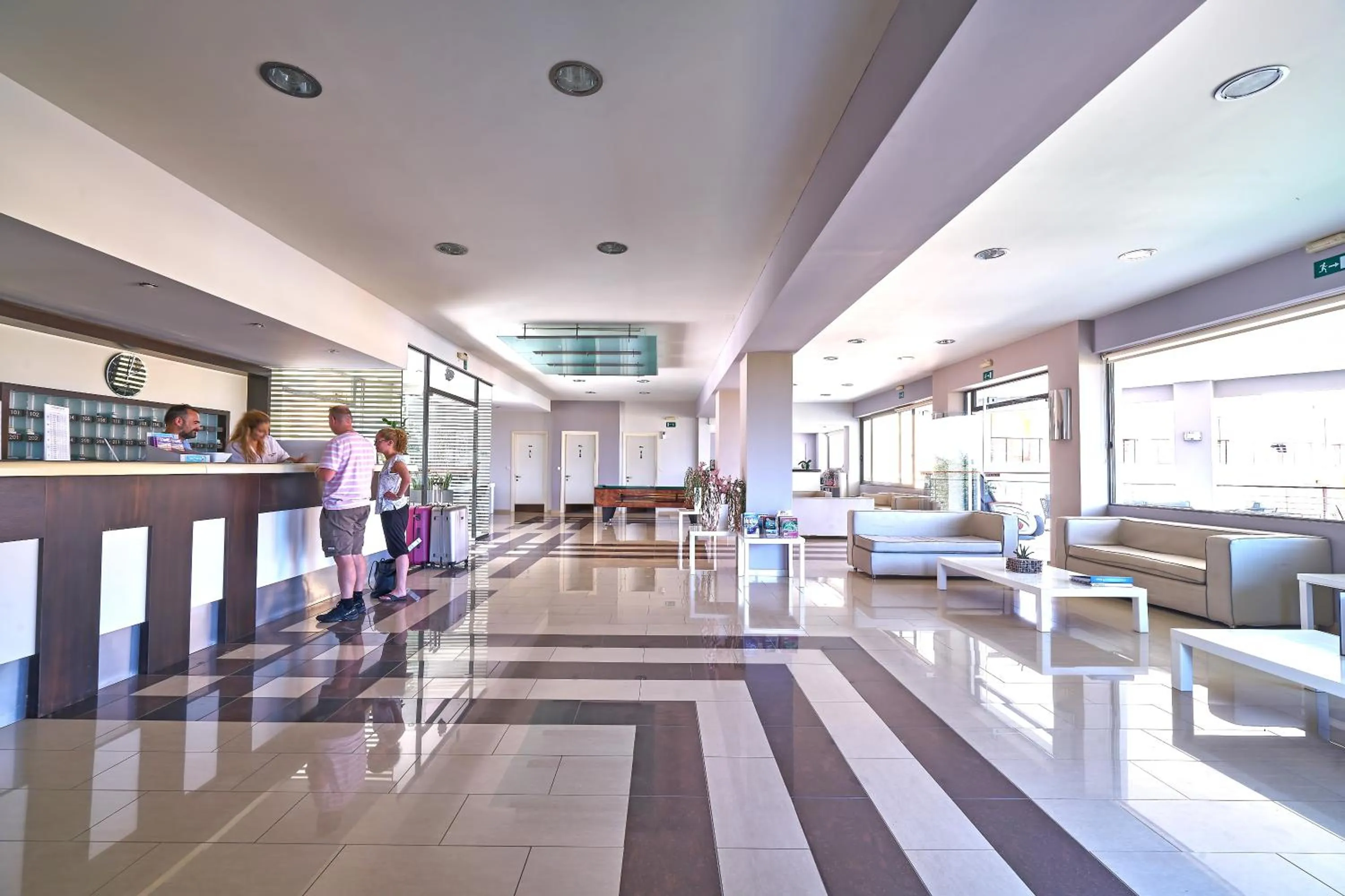 Communal lounge/ TV room in Sunrise Village Hotel - All Inclusive