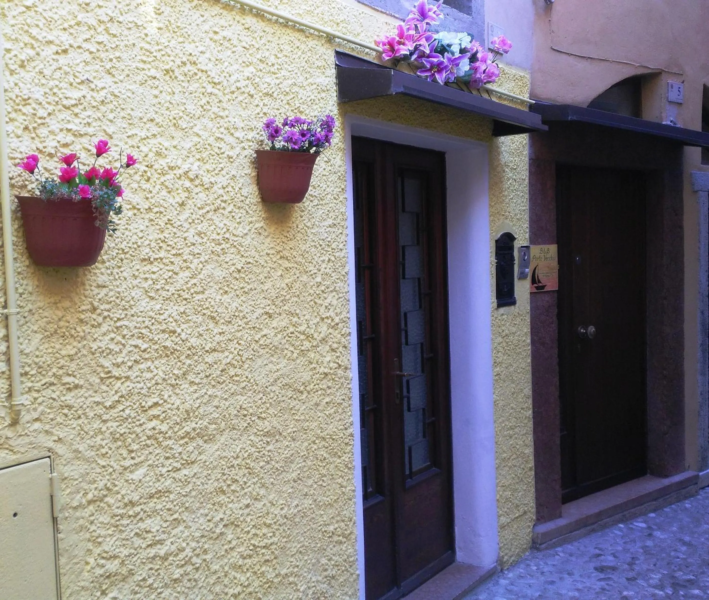 Property building in Camere Porto Vecchio con parcheggio a pochi passi dal castello