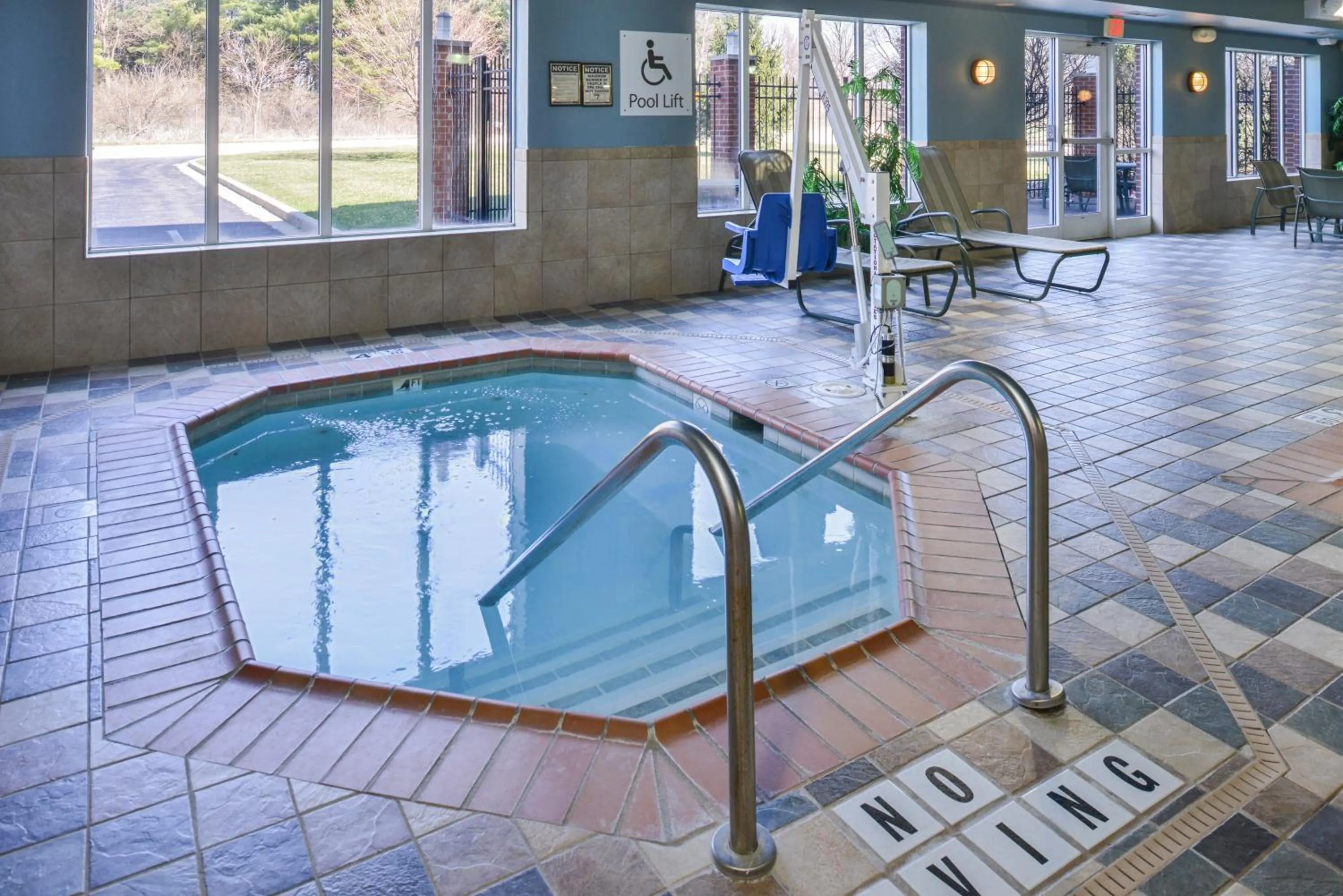 Swimming pool in Holiday Inn Express Hotel & Suites Urbana-Champaign-U of I Area by IHG