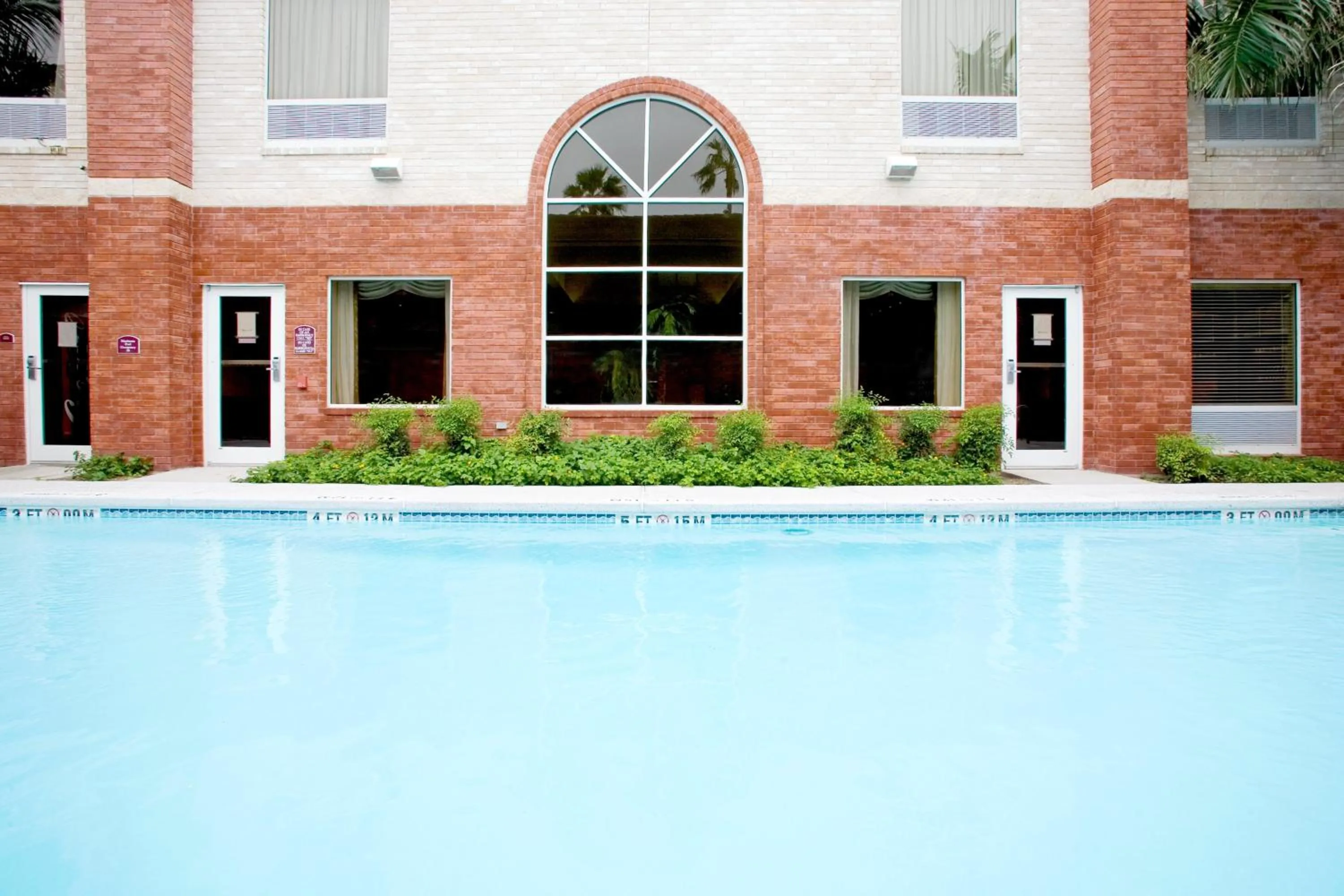 Swimming pool in Holiday Inn Express Hotel and Suites Weslaco by IHG