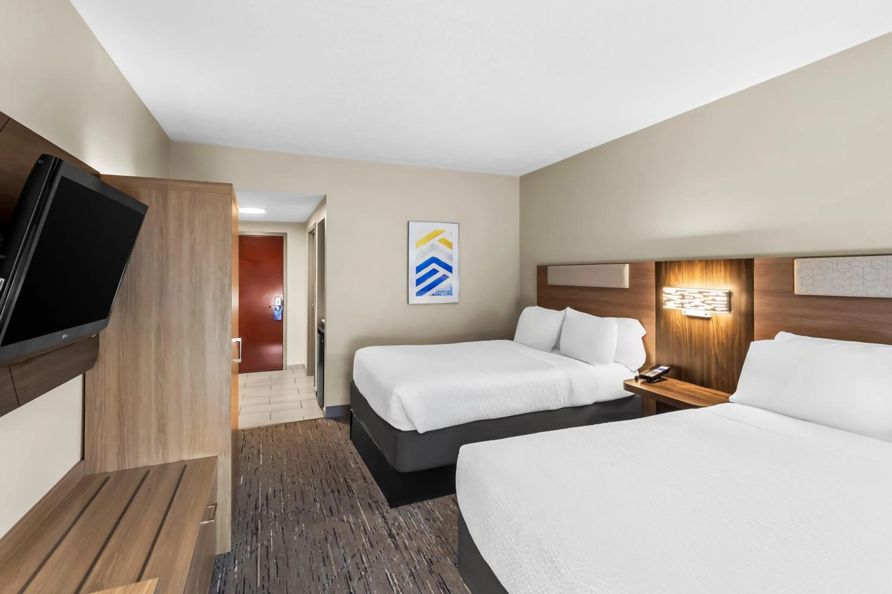 Guests, Bed in Holiday Inn Express Hotel & Suites Charleston-Southridge by IHG