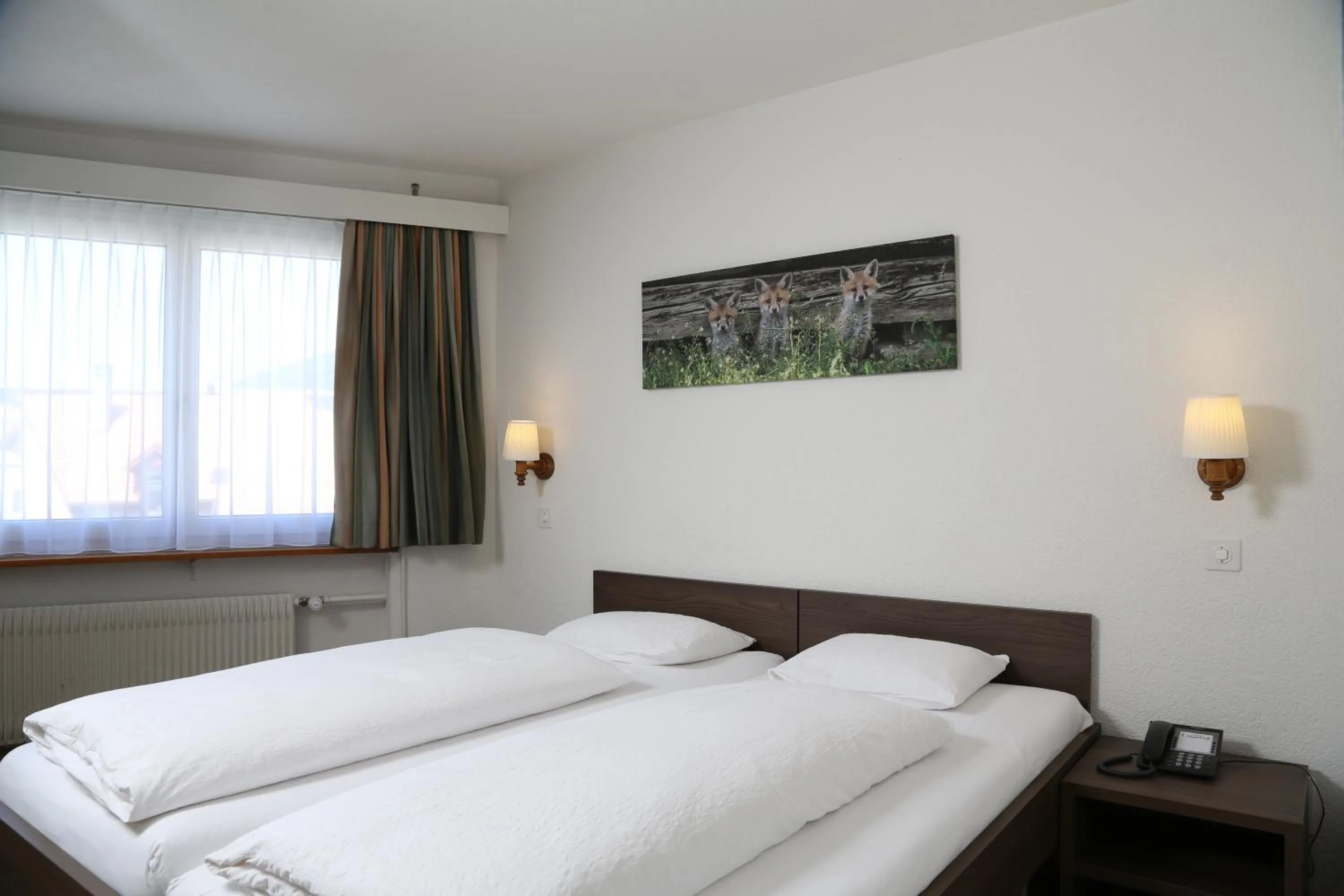 Photo of the whole room, Bed in Hotel Crystal Interlaken