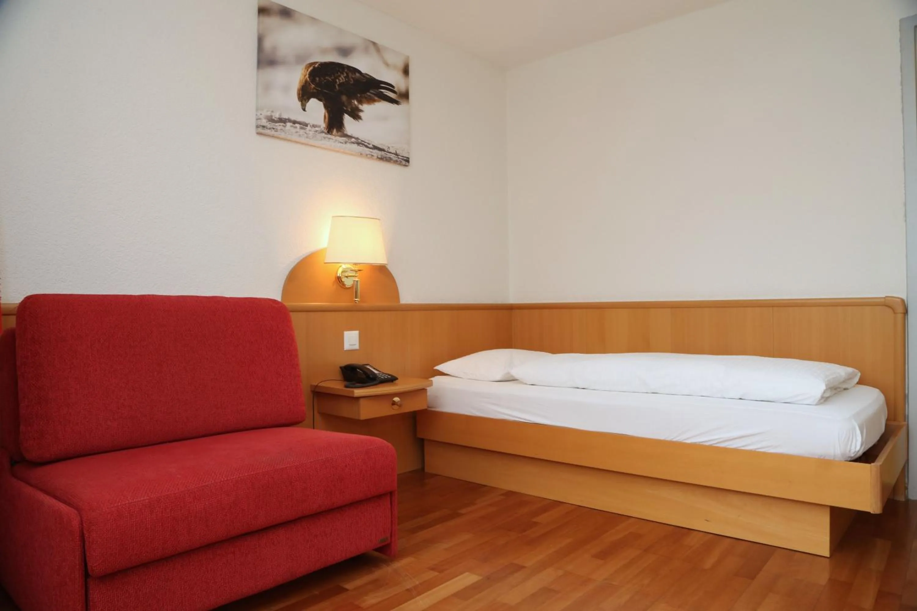 Photo of the whole room, Bed in Hotel Crystal Interlaken