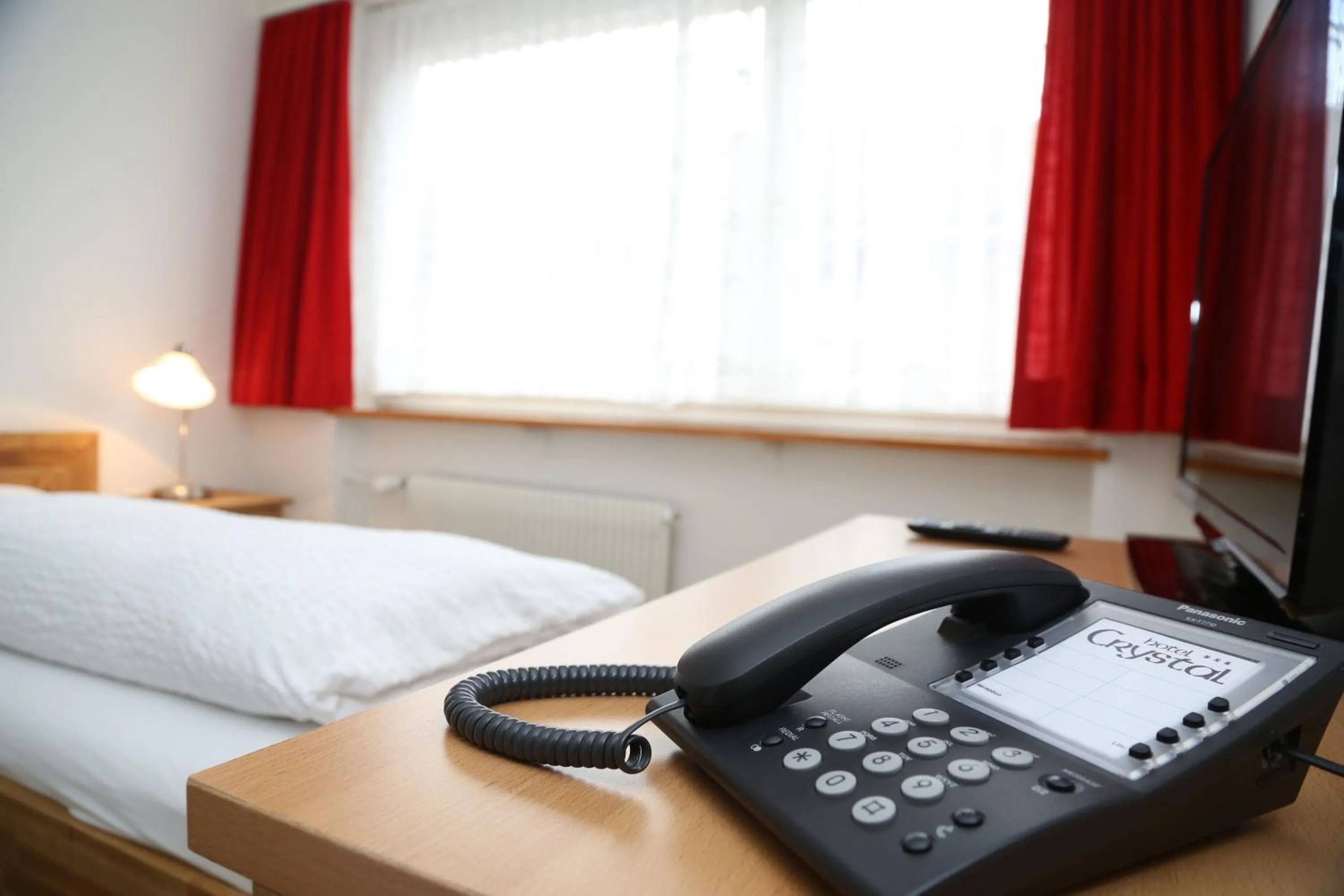 Decorative detail, Bed in Hotel Crystal Interlaken