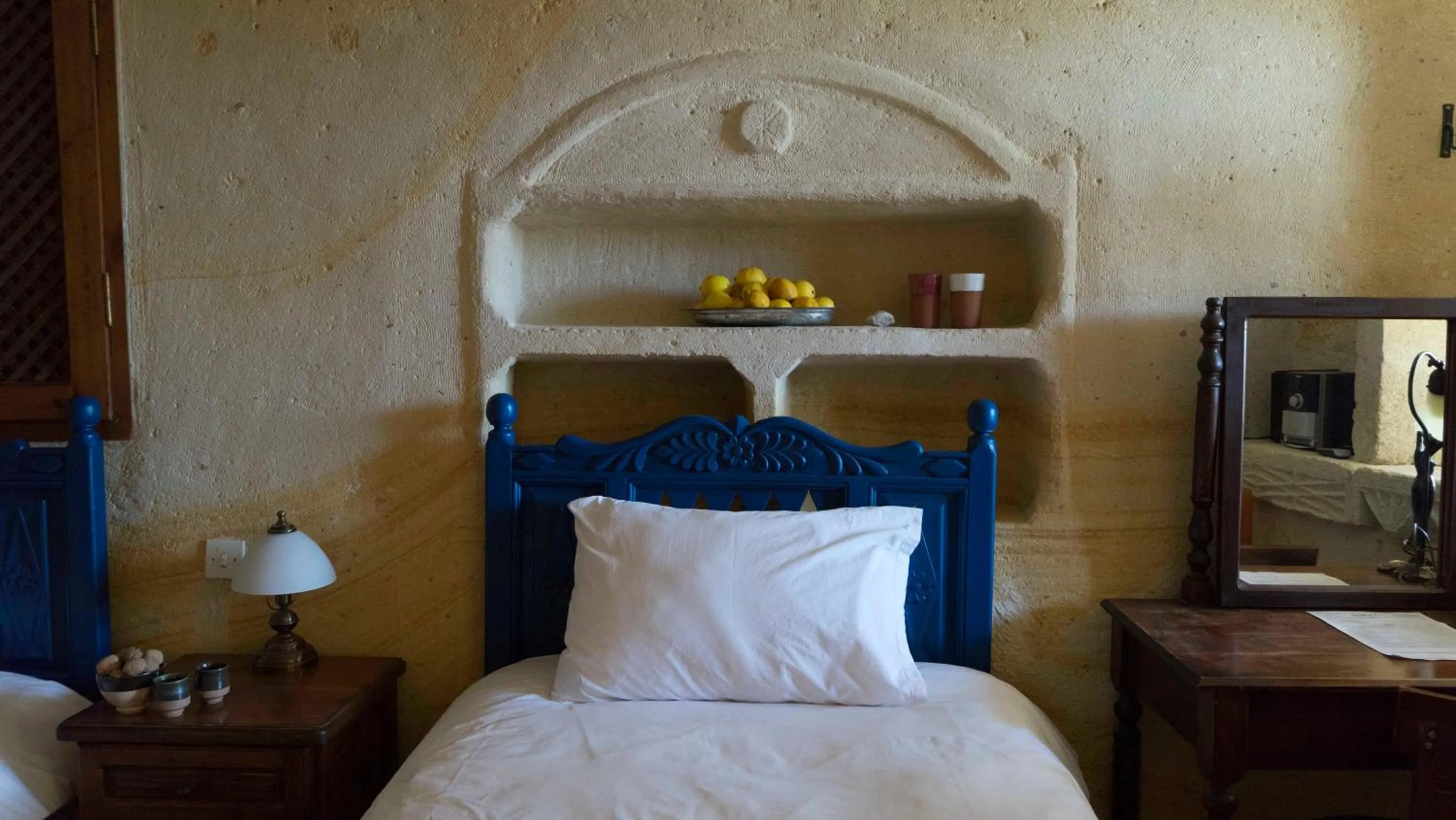 Bed in Elkep Evi Cave Hotel