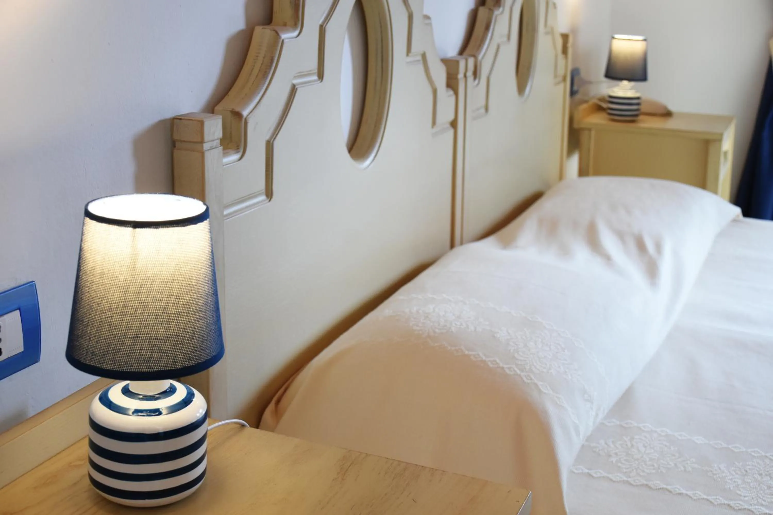 Bed in Le Anfore Hotel