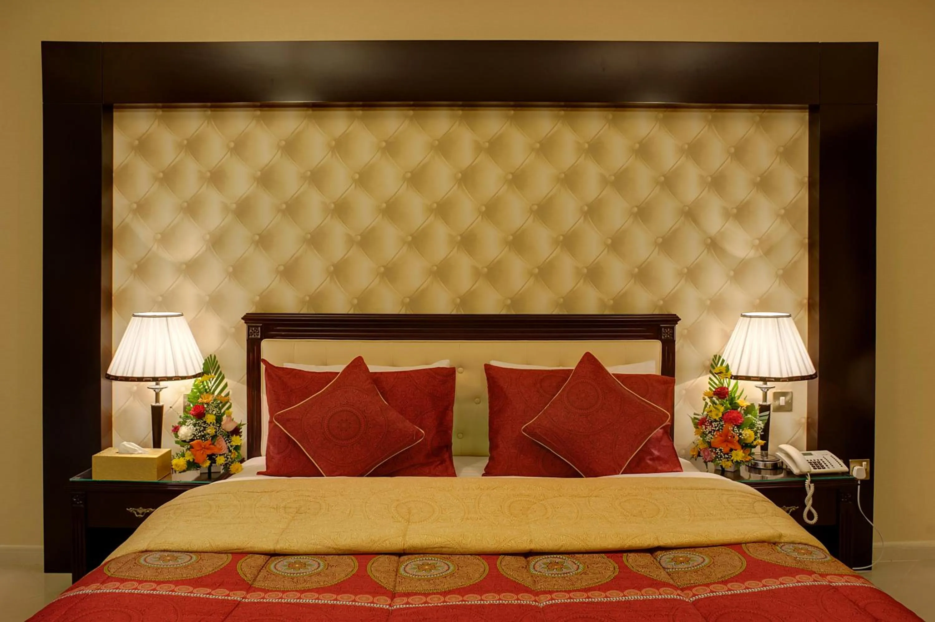 Bed in Deira Suites Deluxe Hotel Suites