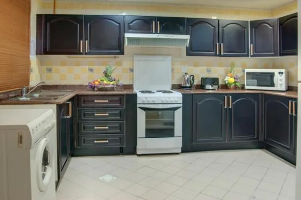 Kitchen or kitchenette in Deira Suites Deluxe Hotel Suites