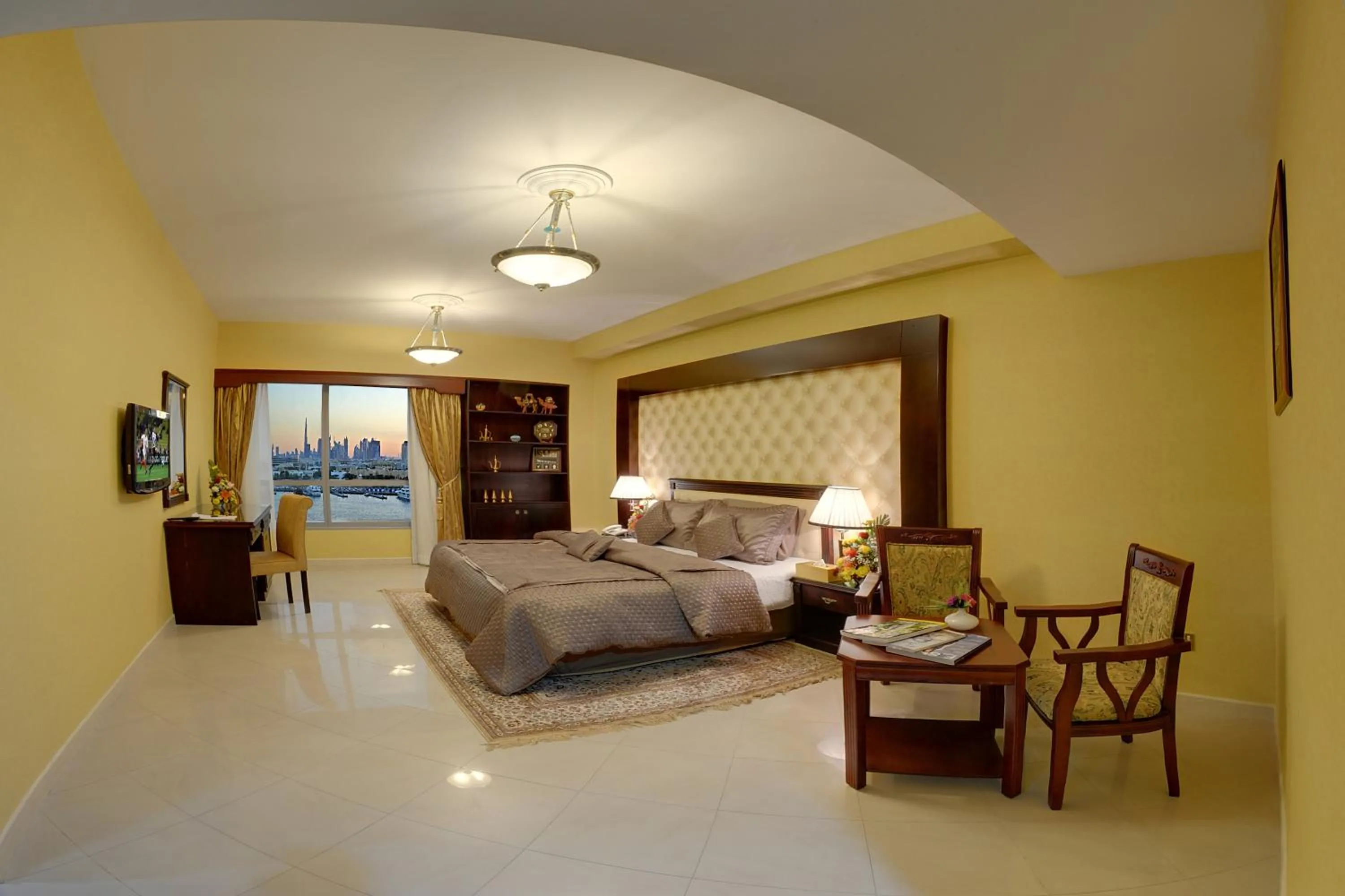 Bed in Deira Suites Deluxe Hotel Suites