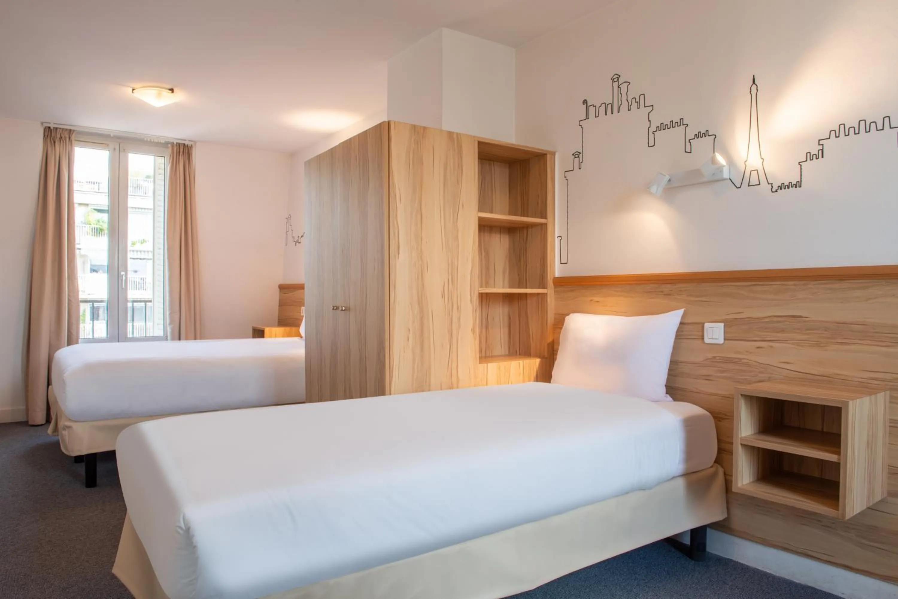 Bed in Au Pacific Hotel