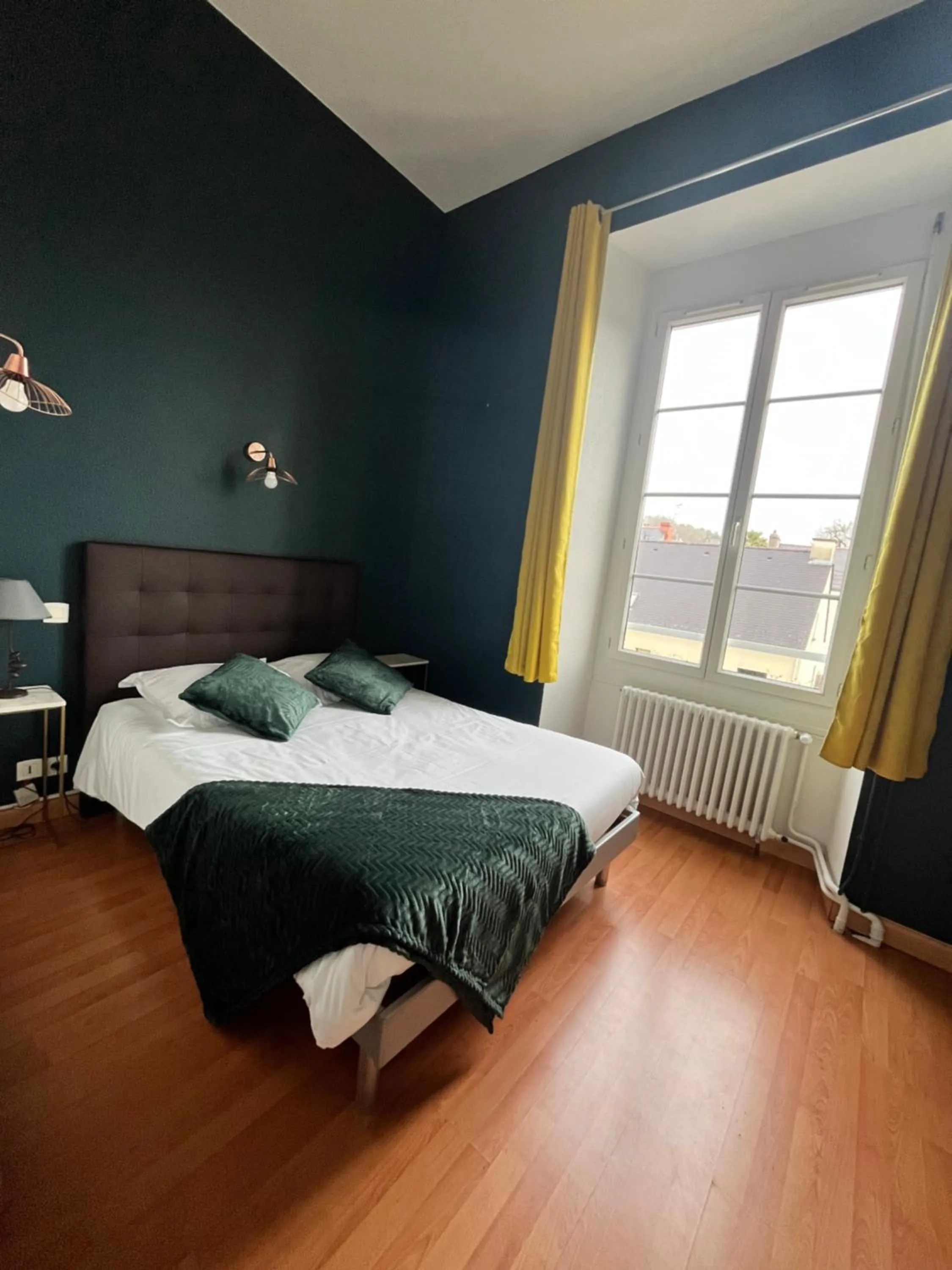 Photo of the whole room, Bed in Hôtel de Bretagne