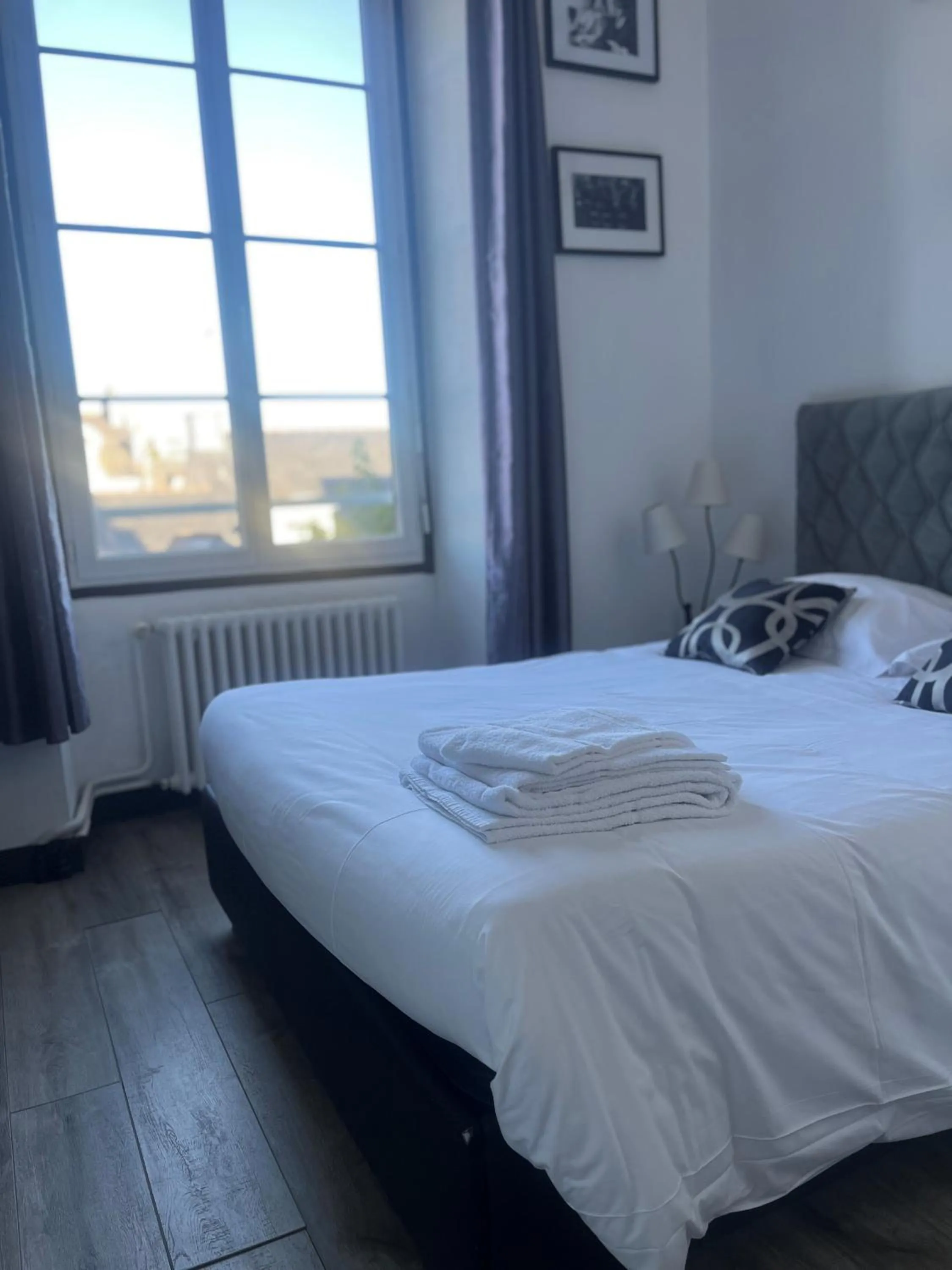 Bed in Hôtel de Bretagne