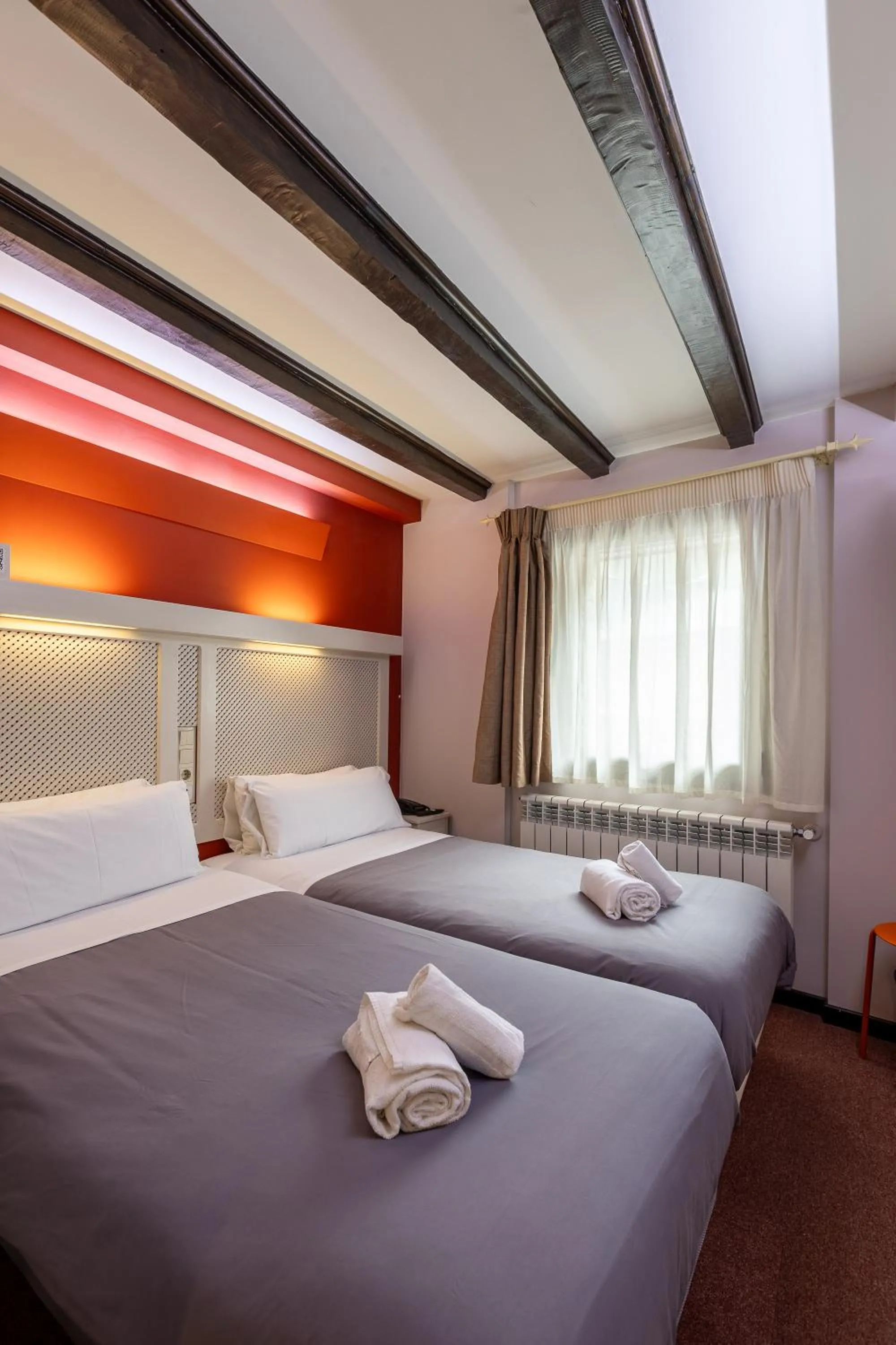 Bed in Hotel Micolau