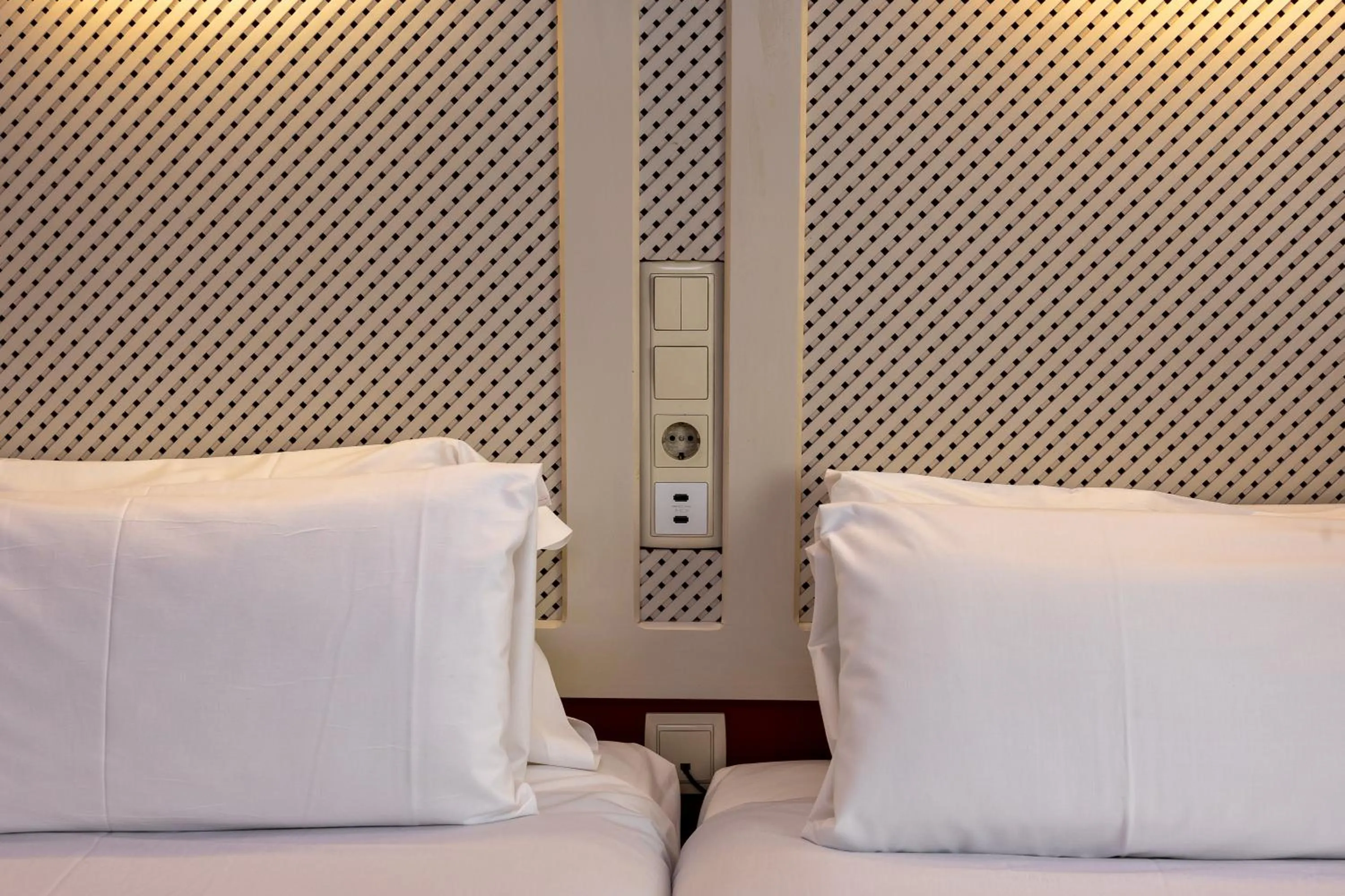 Bed in Hotel Micolau