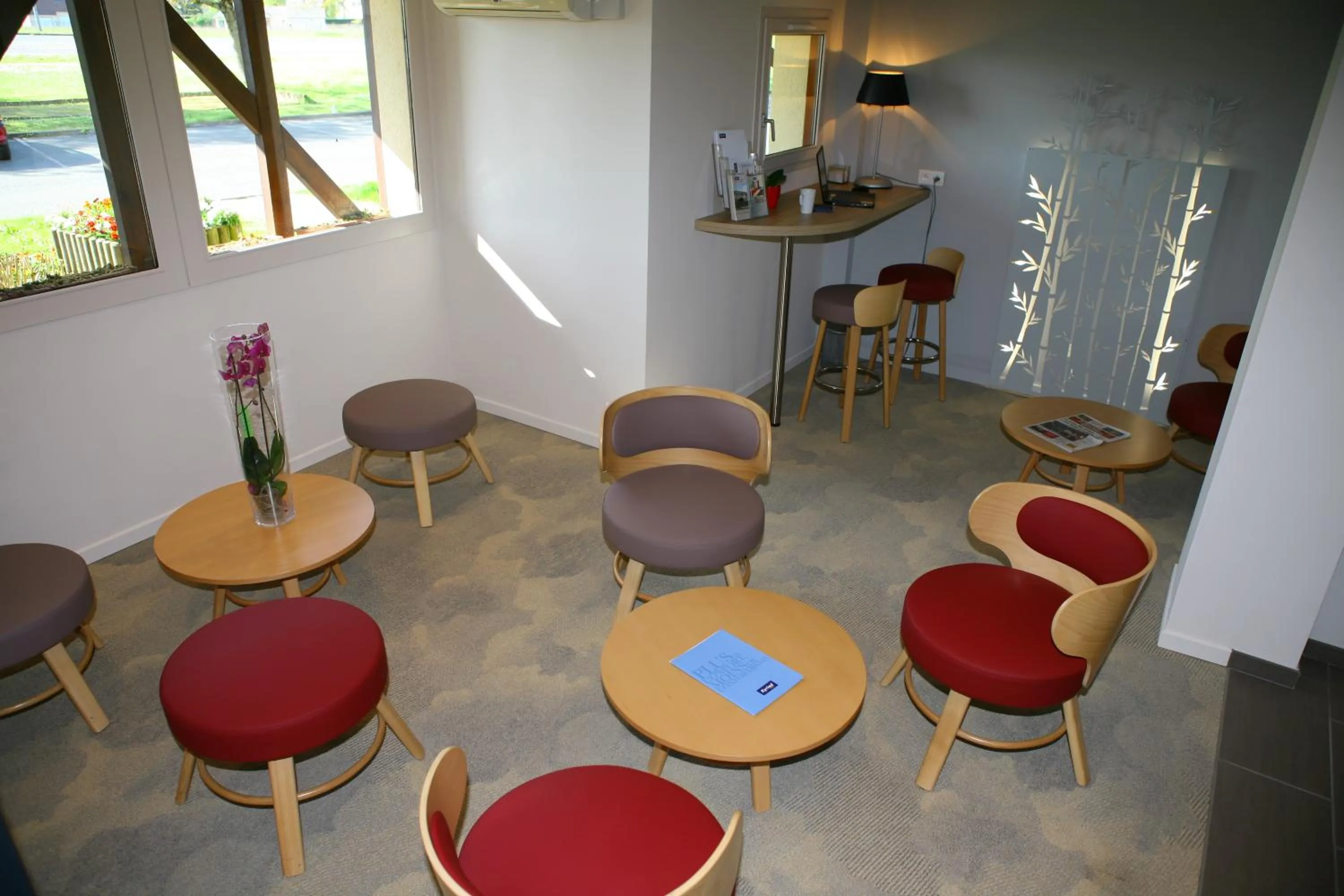 Communal lounge/ TV room in Kyriad Chateauroux