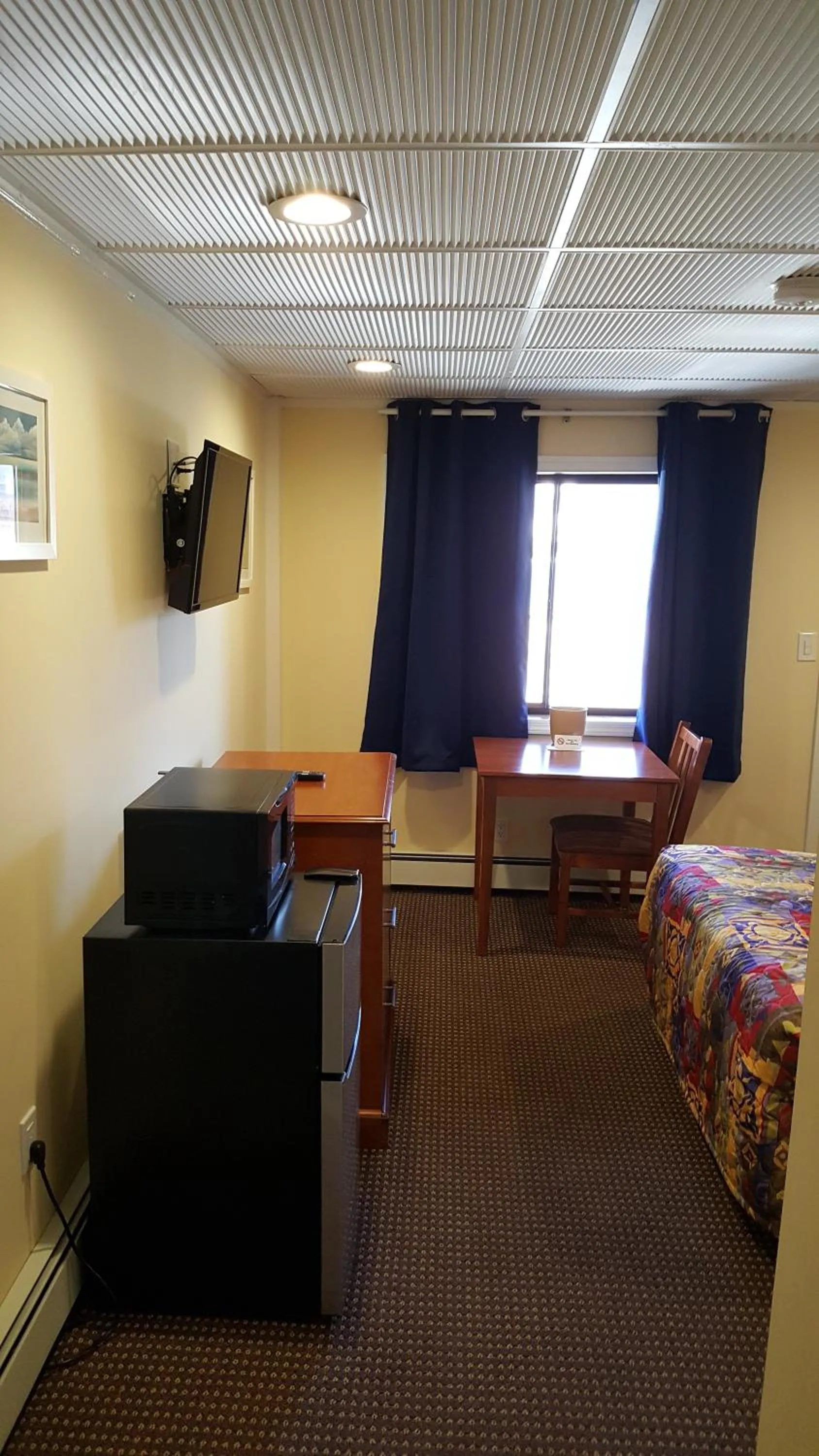 Bed in Atlantic Motel