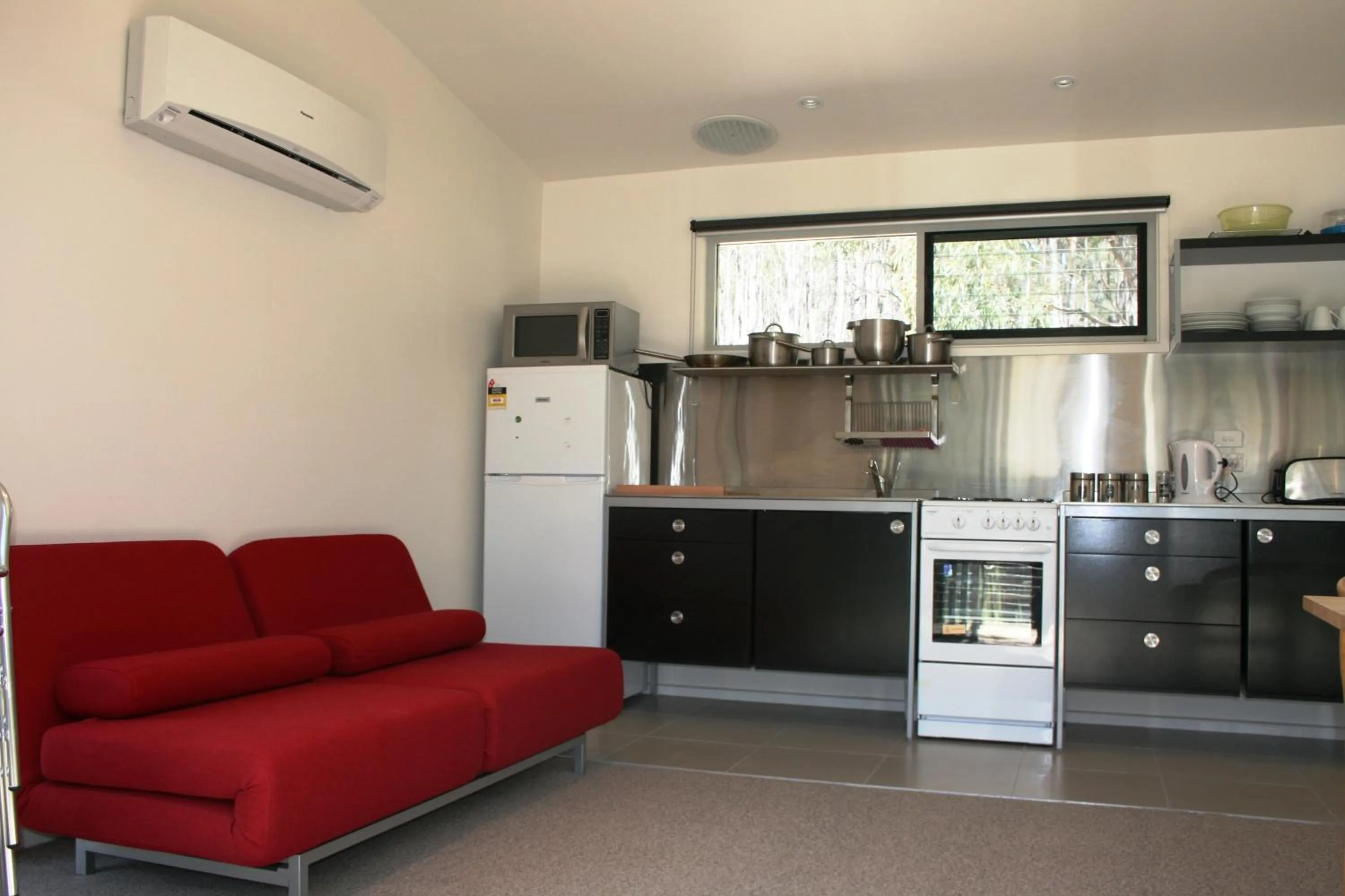 Kitchen or kitchenette in Craggy Peaks Wilderness Cabins