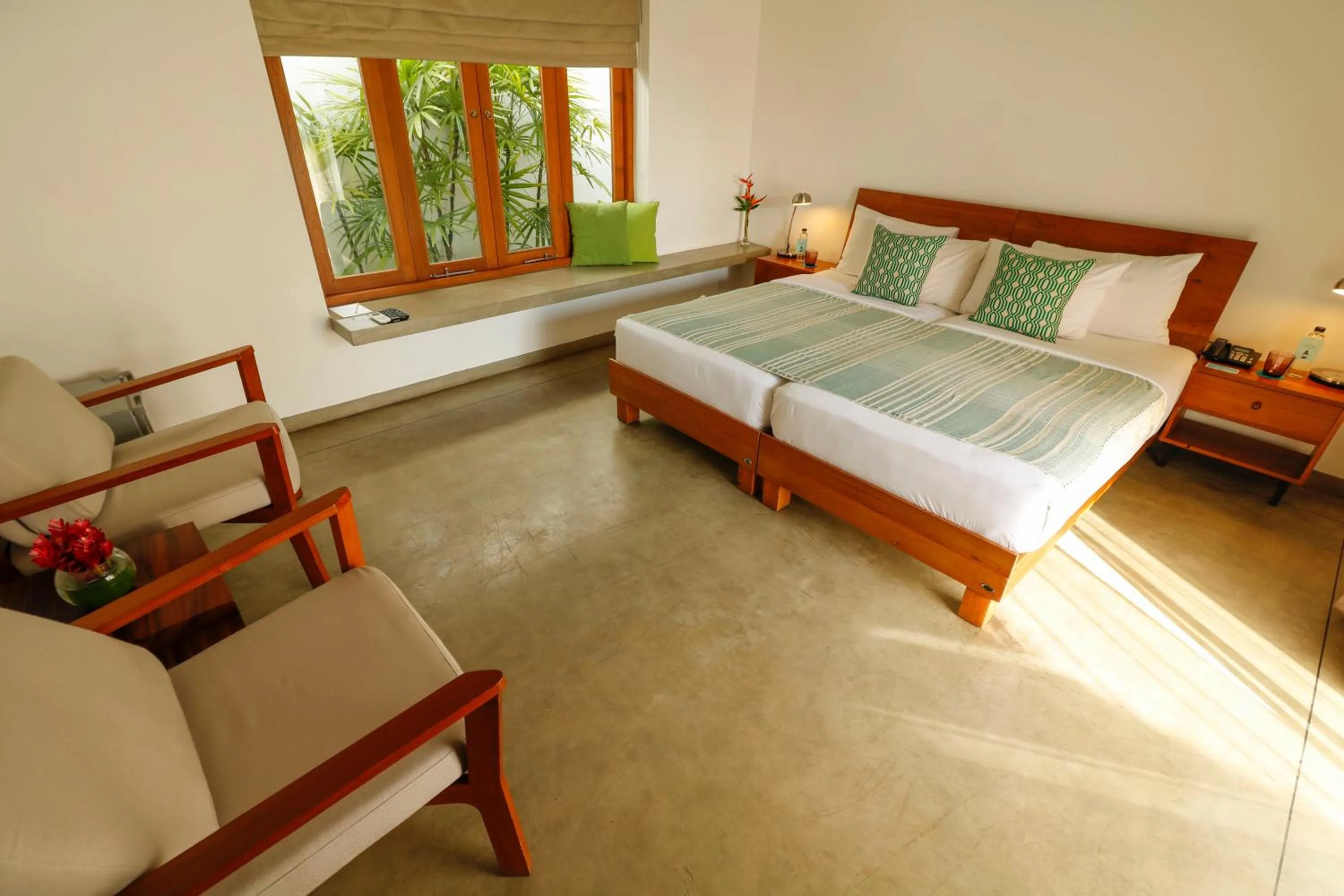 Bed in Ubuntu Beach Villas by Reveal