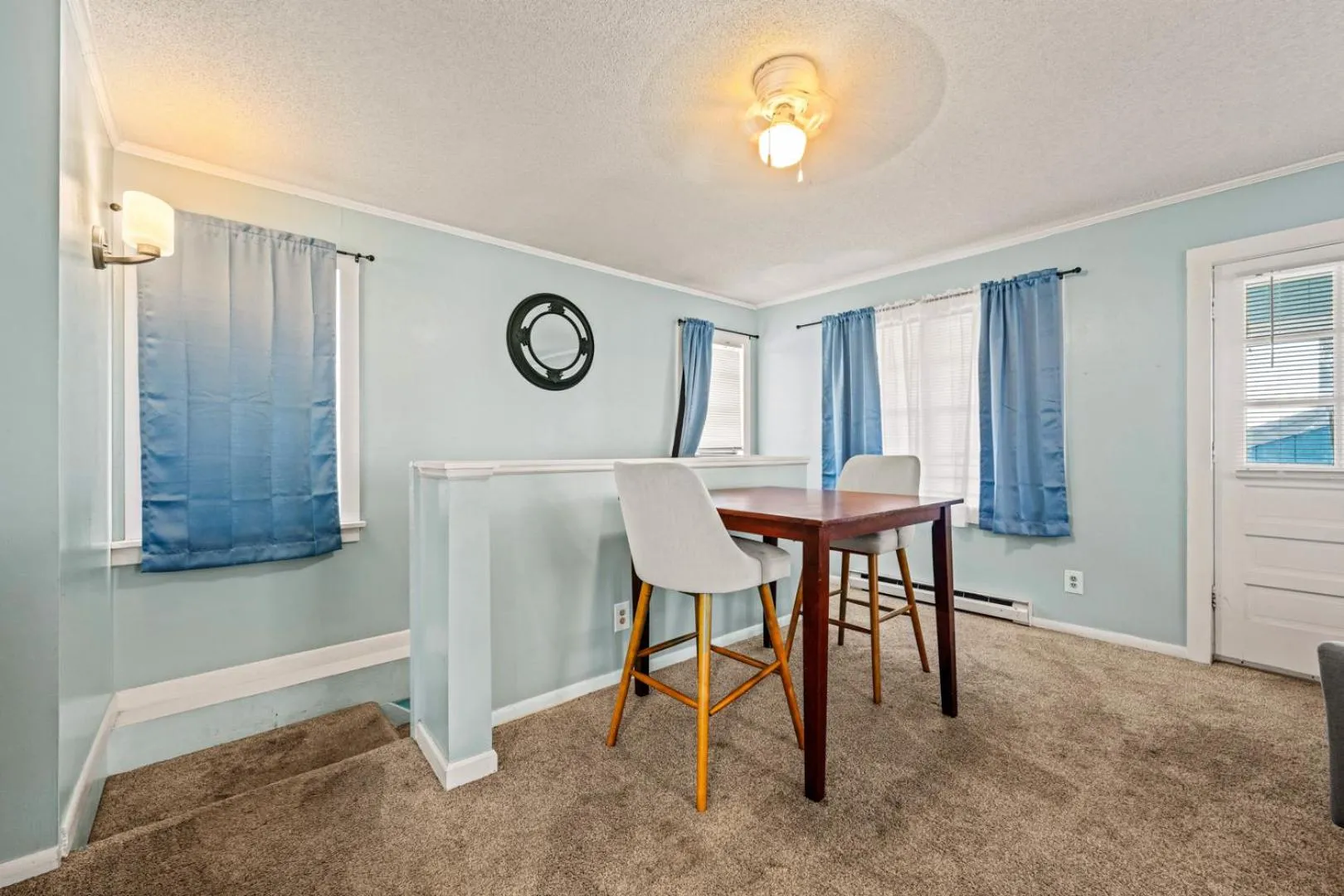 Seating area in Oceanside Court by KEES Vacations