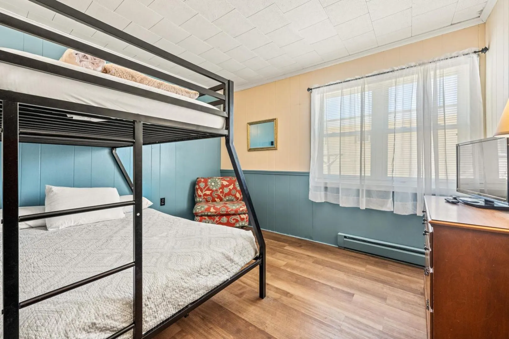 Bed in Oceanside Court by KEES Vacations