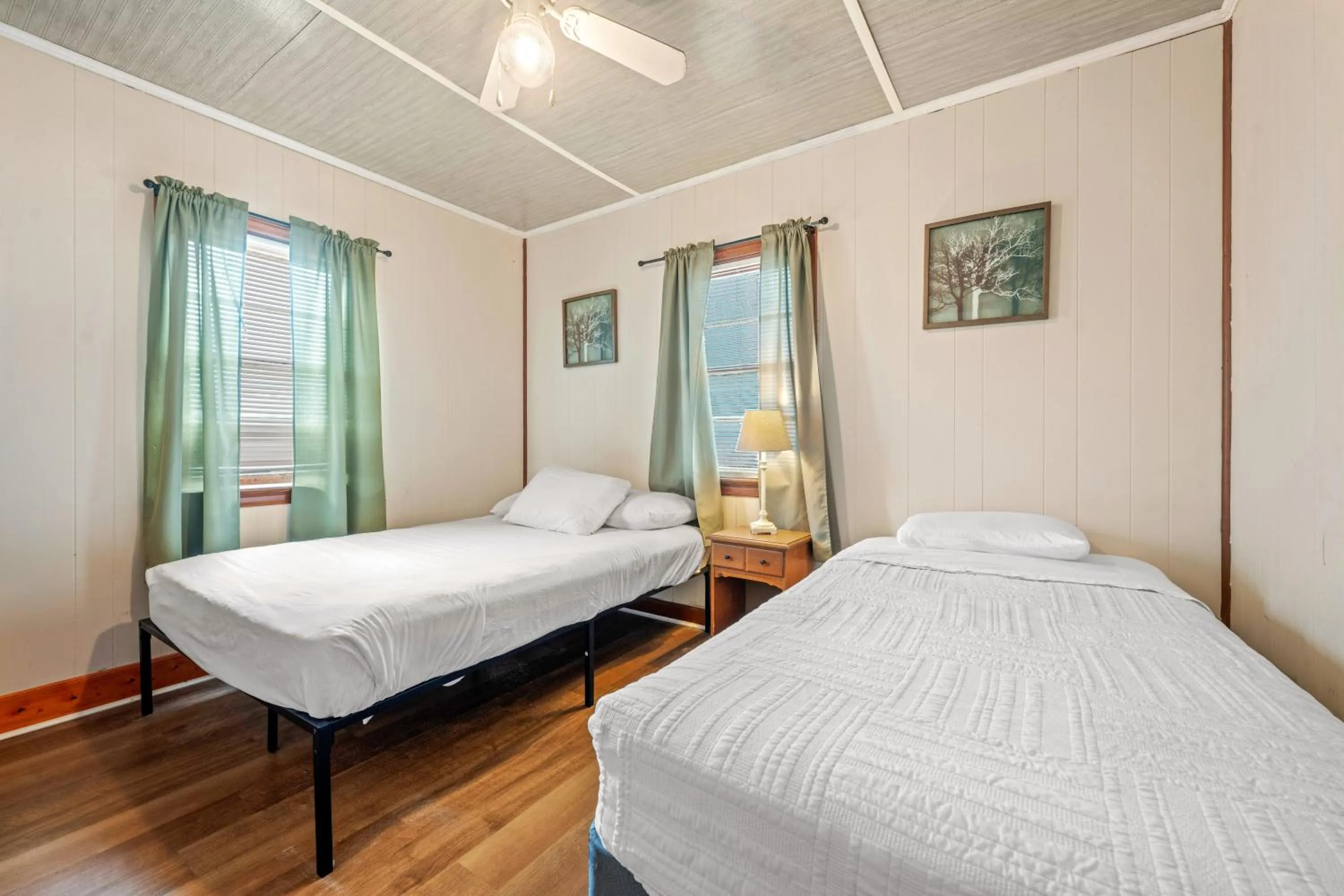 Bed in Oceanside Court by KEES Vacations