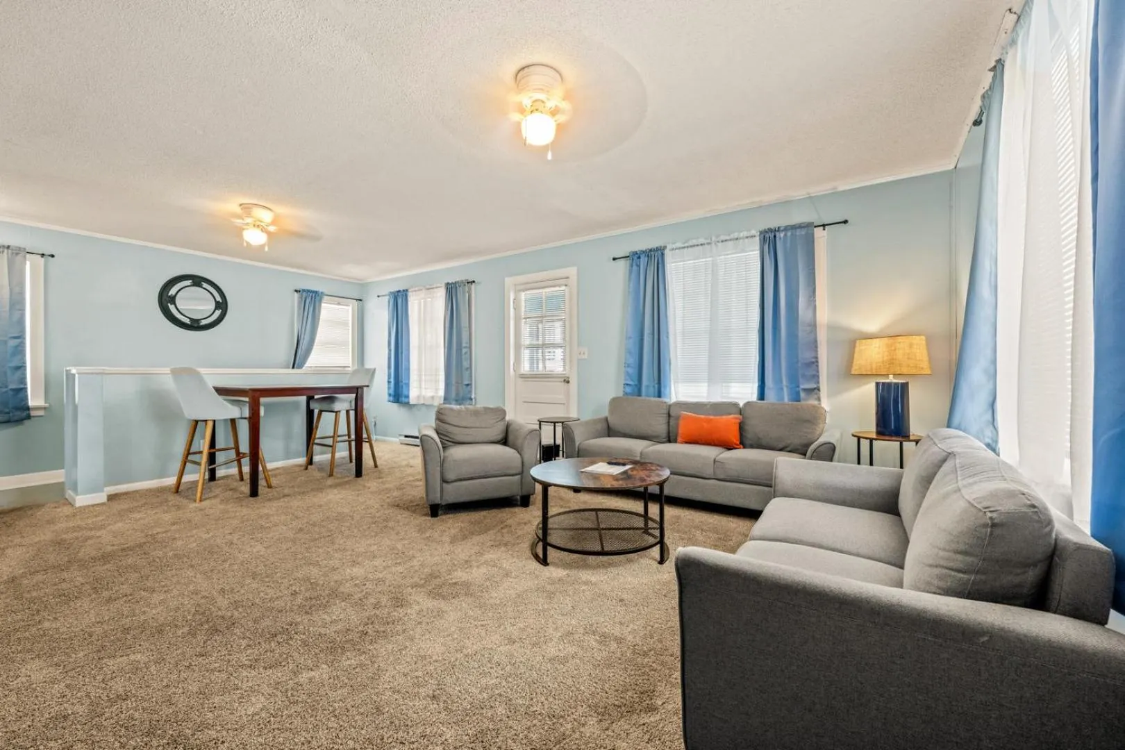 Living room in Oceanside Court by KEES Vacations