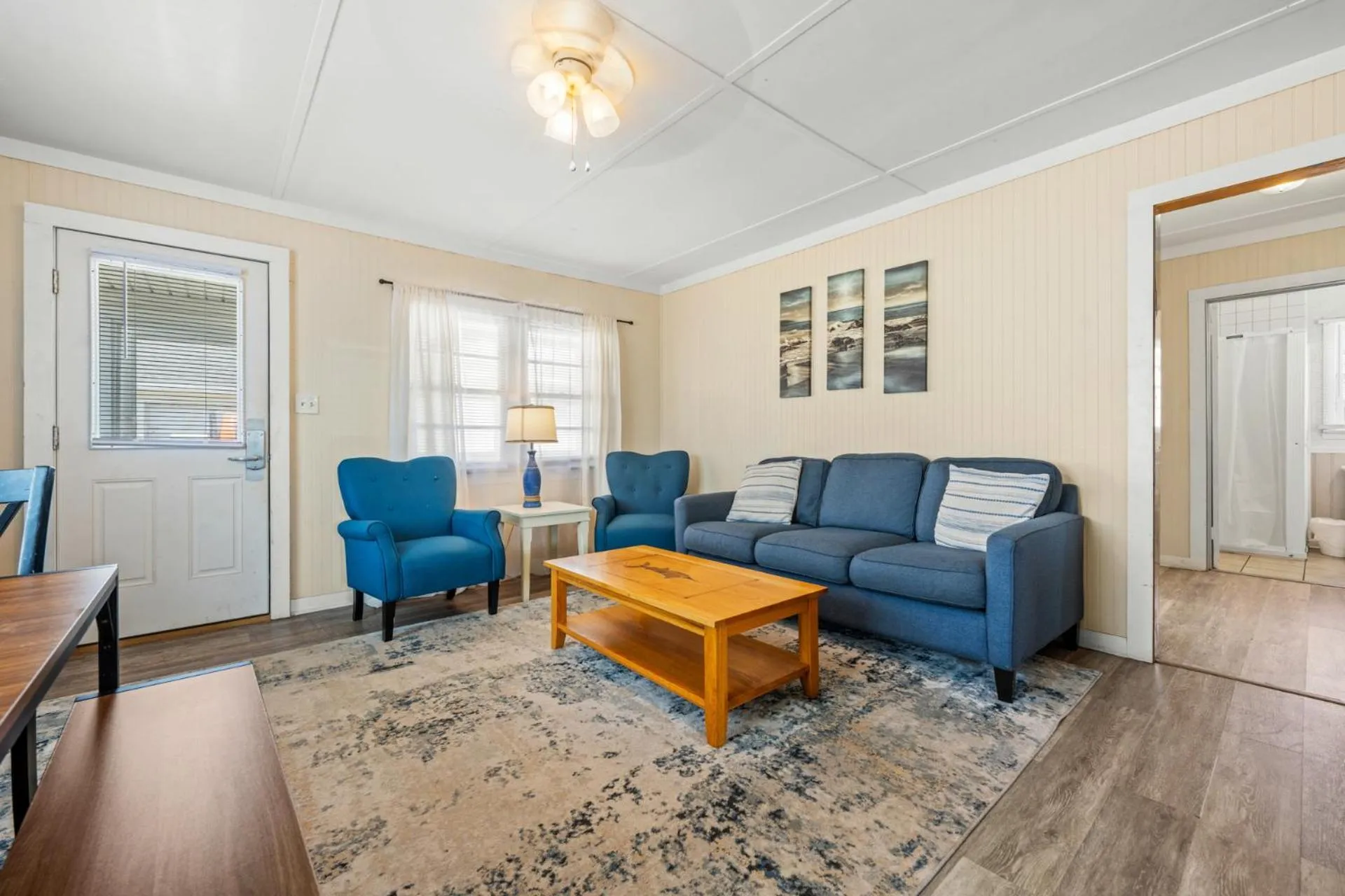 Living room in Oceanside Court by KEES Vacations