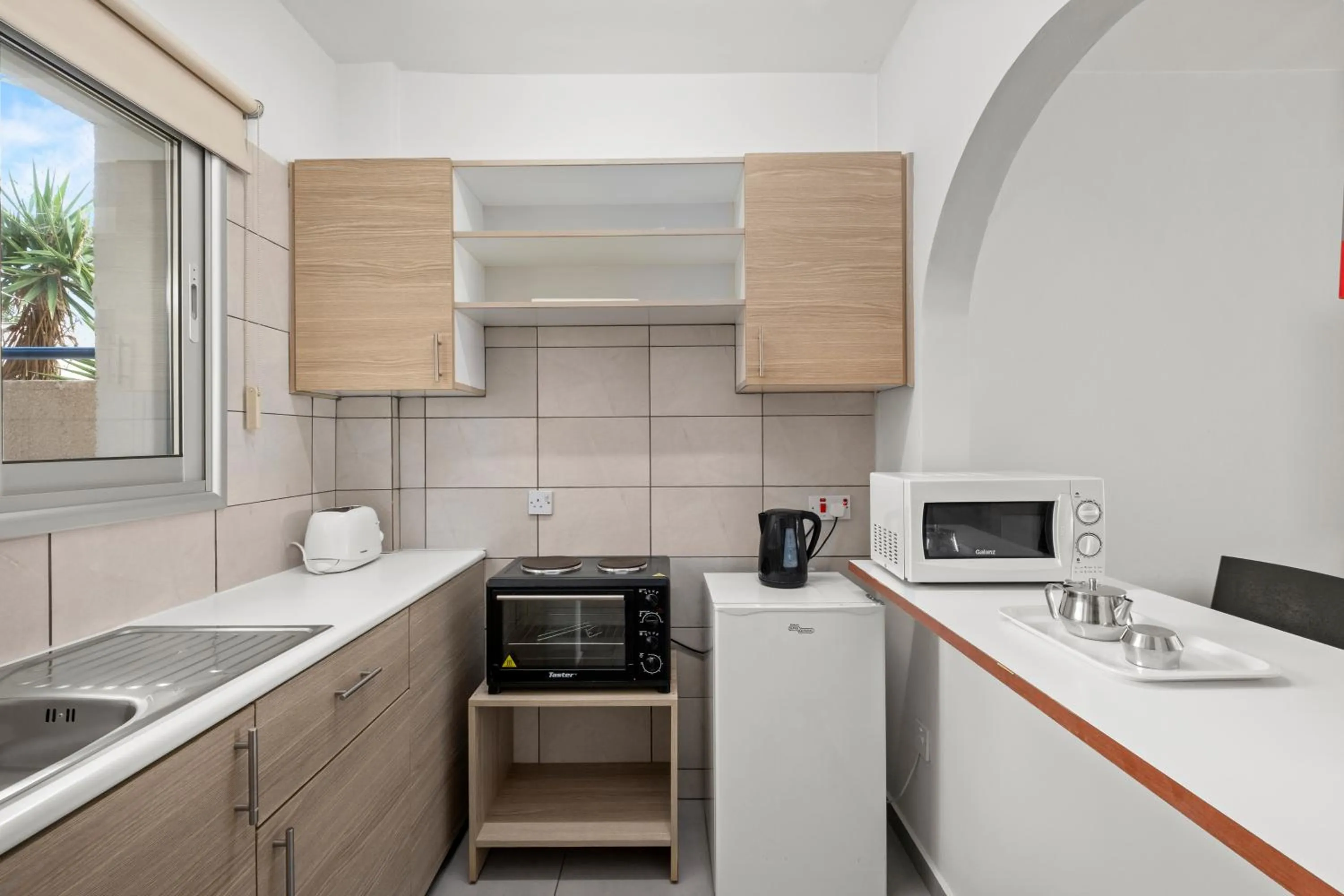 Kitchen or kitchenette in Pandream Hotel Apartments