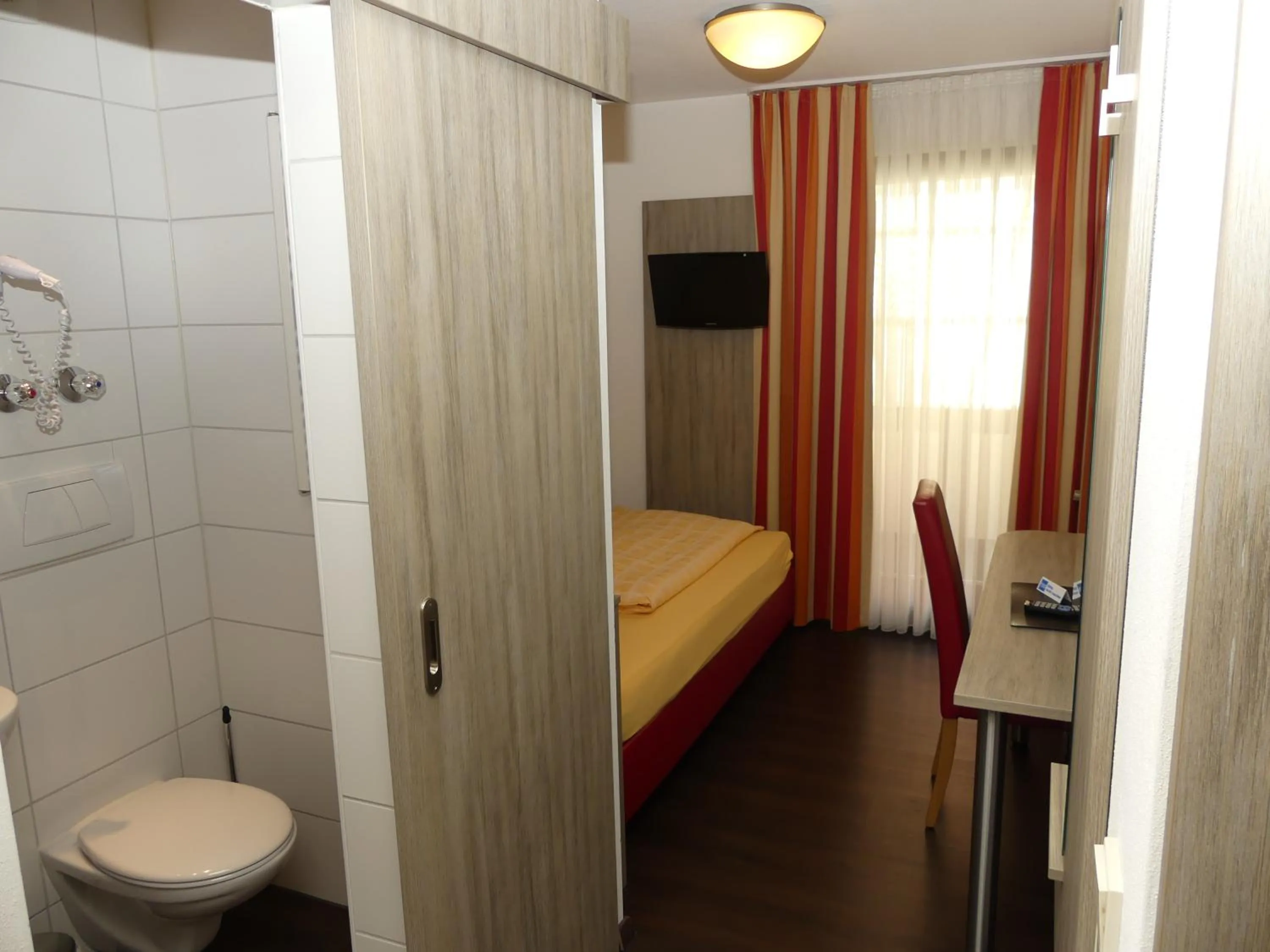 Photo of the whole room, Bed in Hotel KRONE Garni