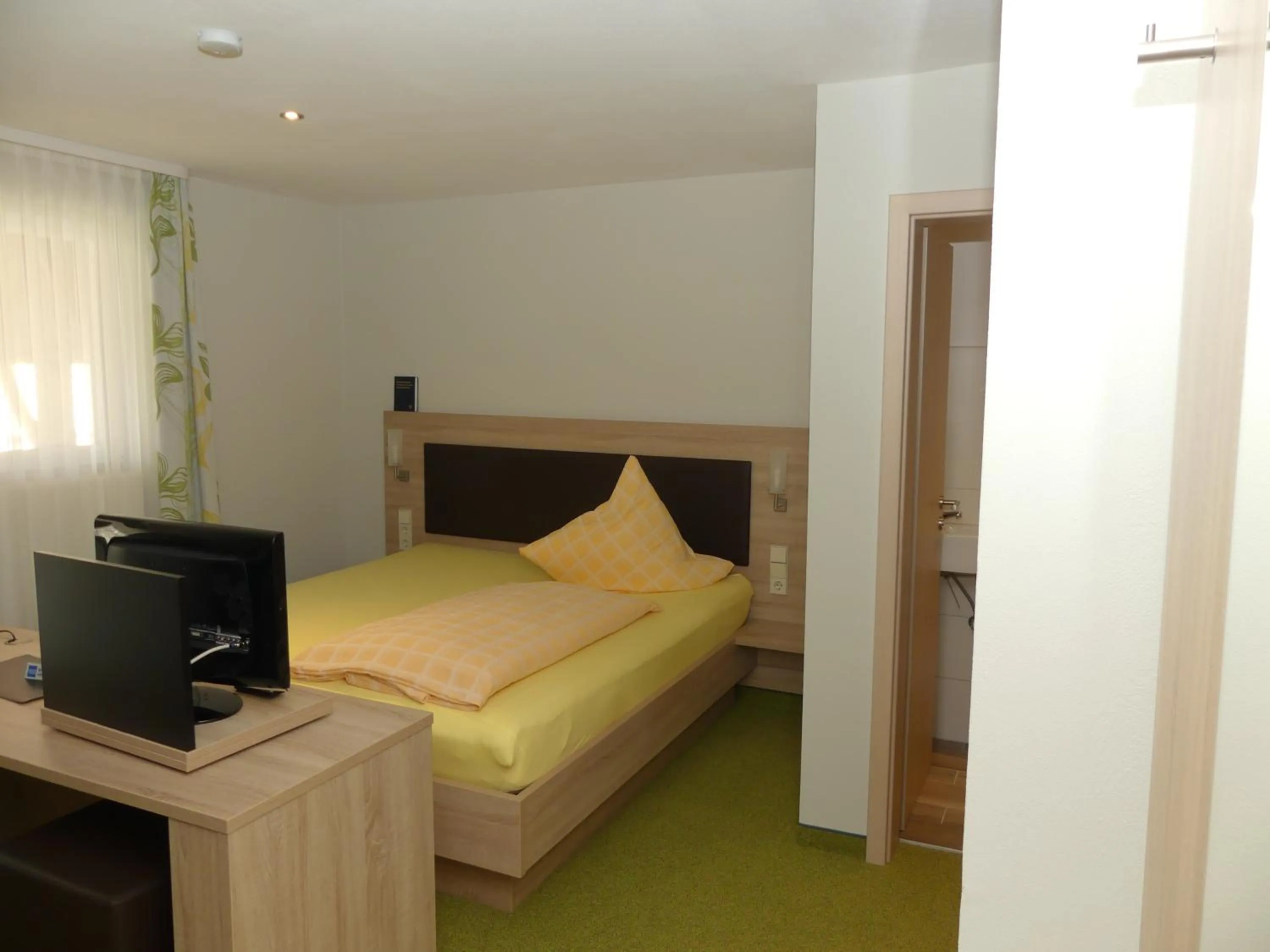 Photo of the whole room, Bed in Hotel KRONE Garni