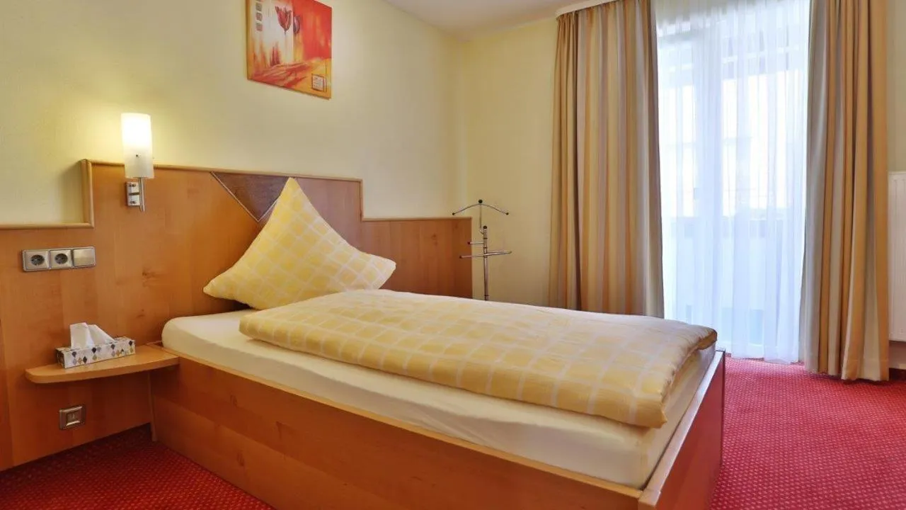 Photo of the whole room, Bed in Hotel KRONE Garni