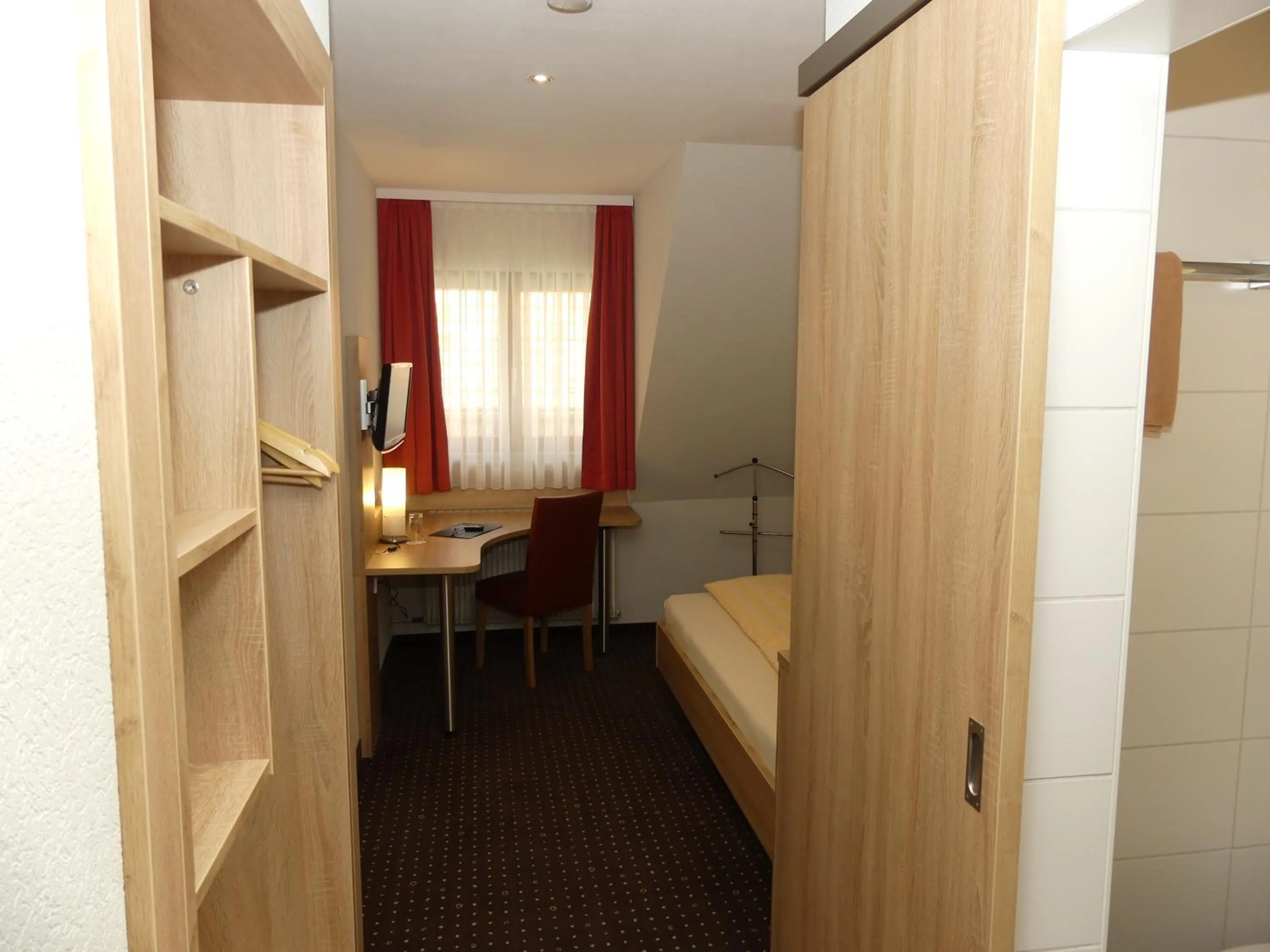 Photo of the whole room, Bed in Hotel KRONE Garni