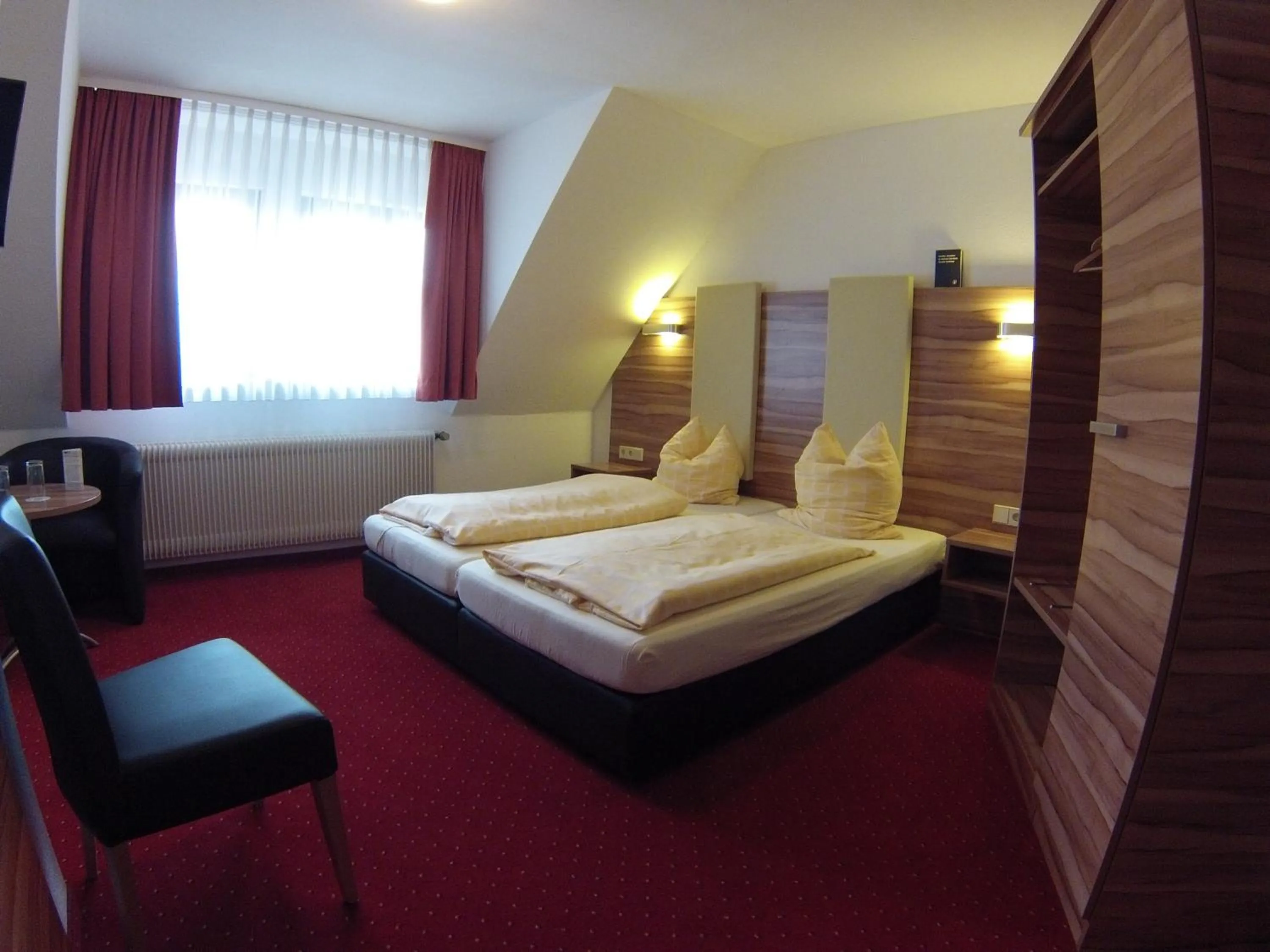 Photo of the whole room, Bed in Hotel KRONE Garni