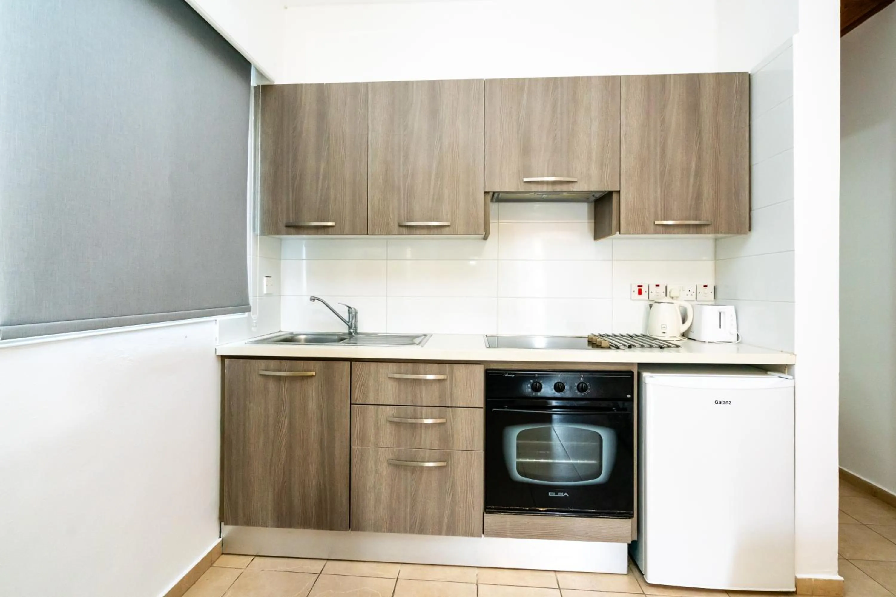 kitchen in Helios Bay Hotel and Suites