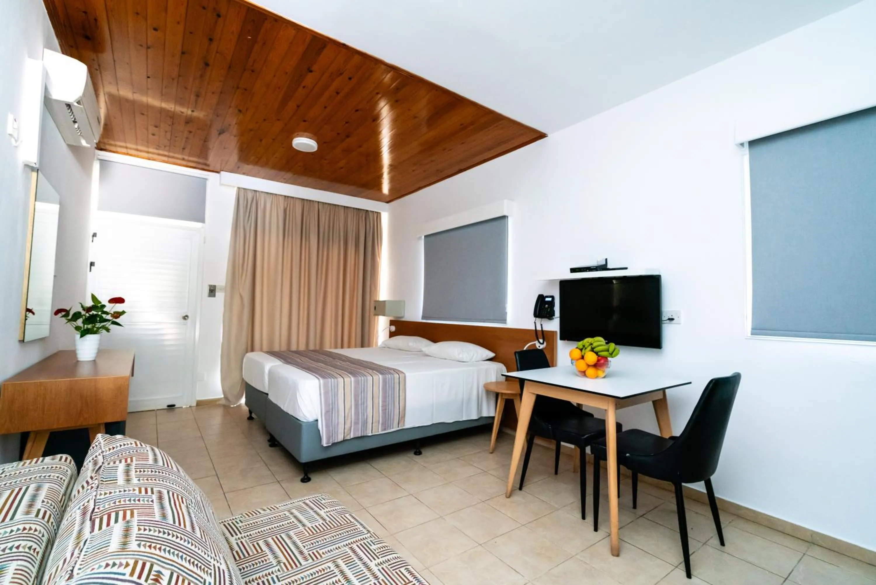 Bedroom, Bed in Helios Bay Hotel and Suites