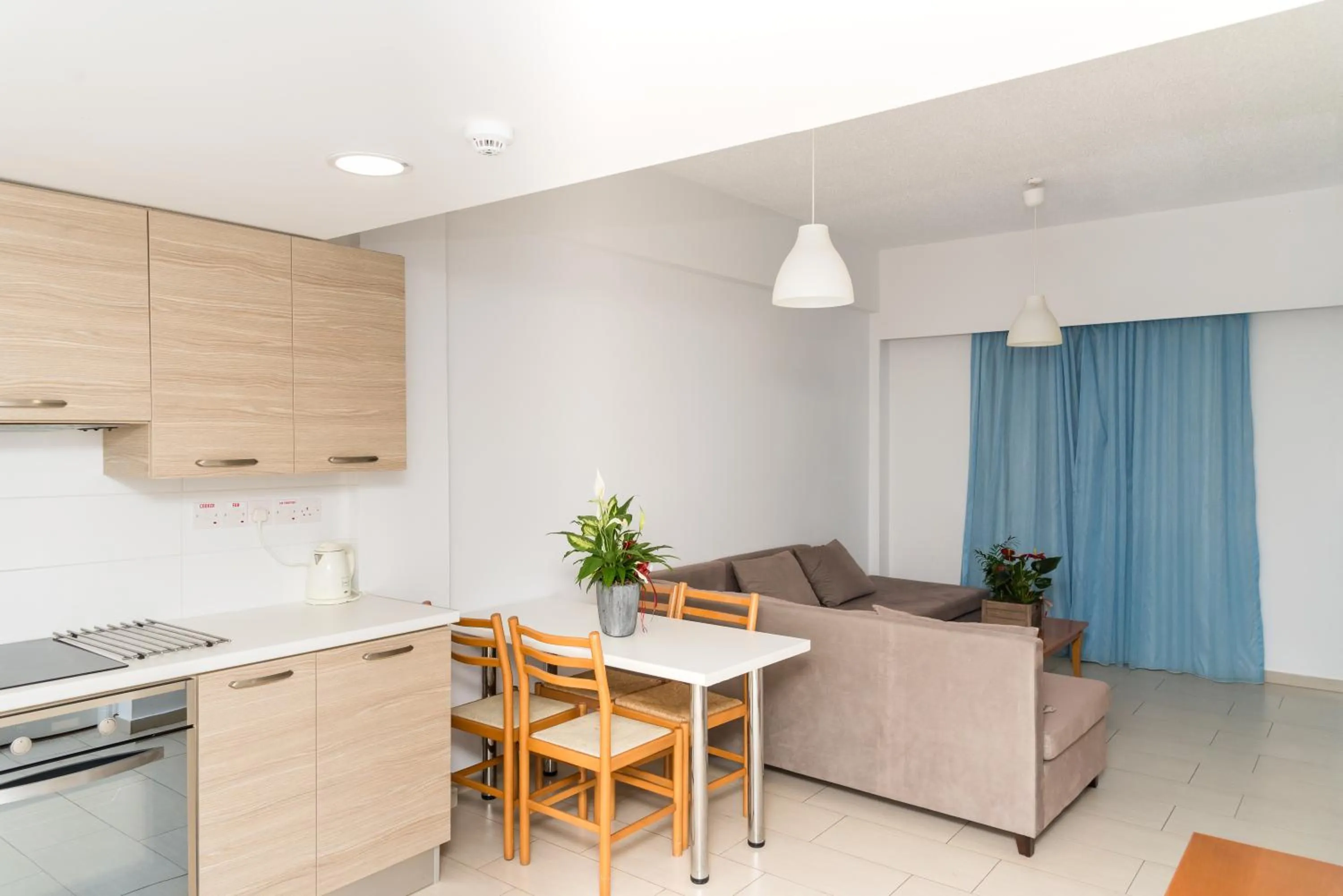 Kitchen or kitchenette in Helios Bay Hotel and Suites