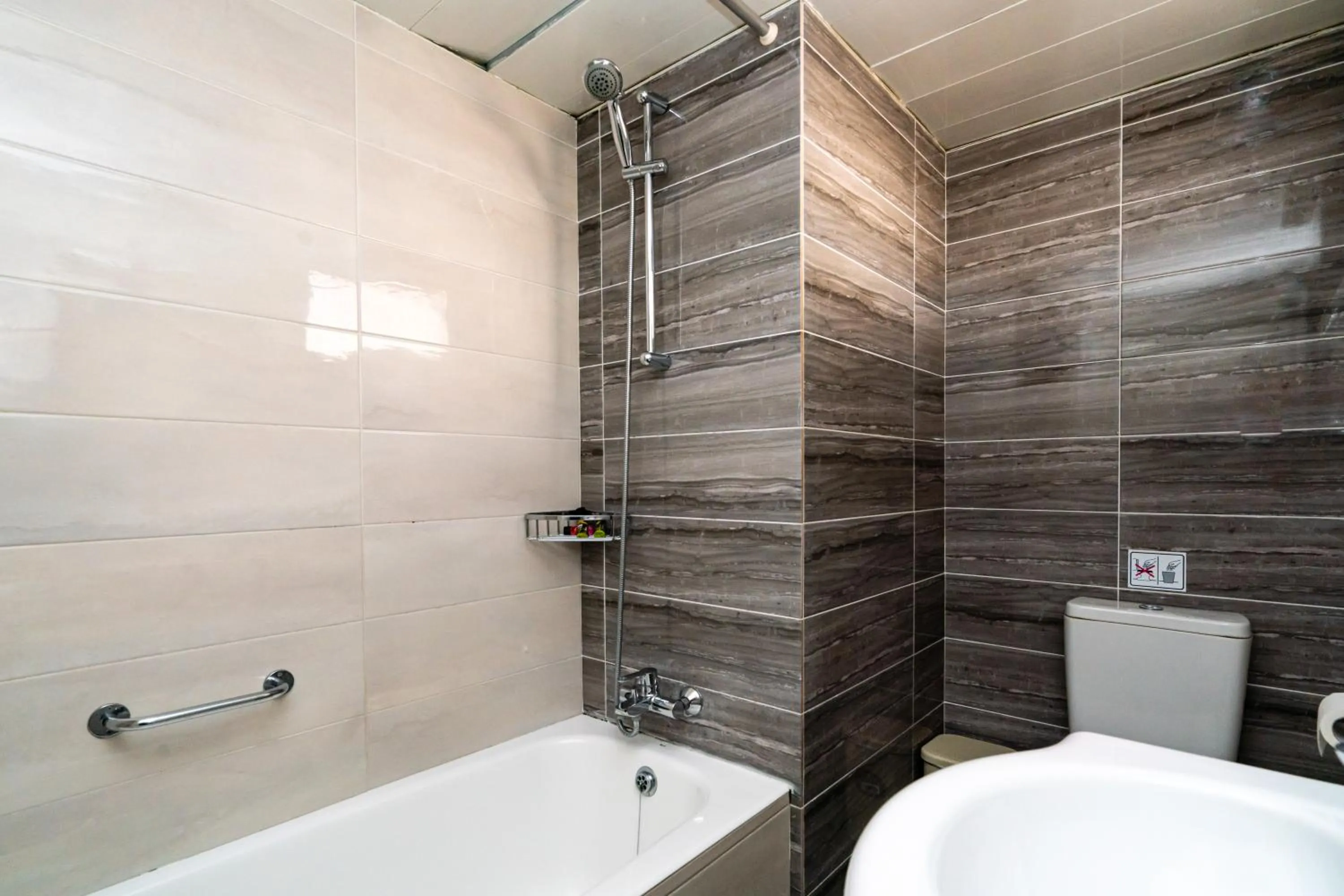 Bathroom in Helios Bay Hotel and Suites