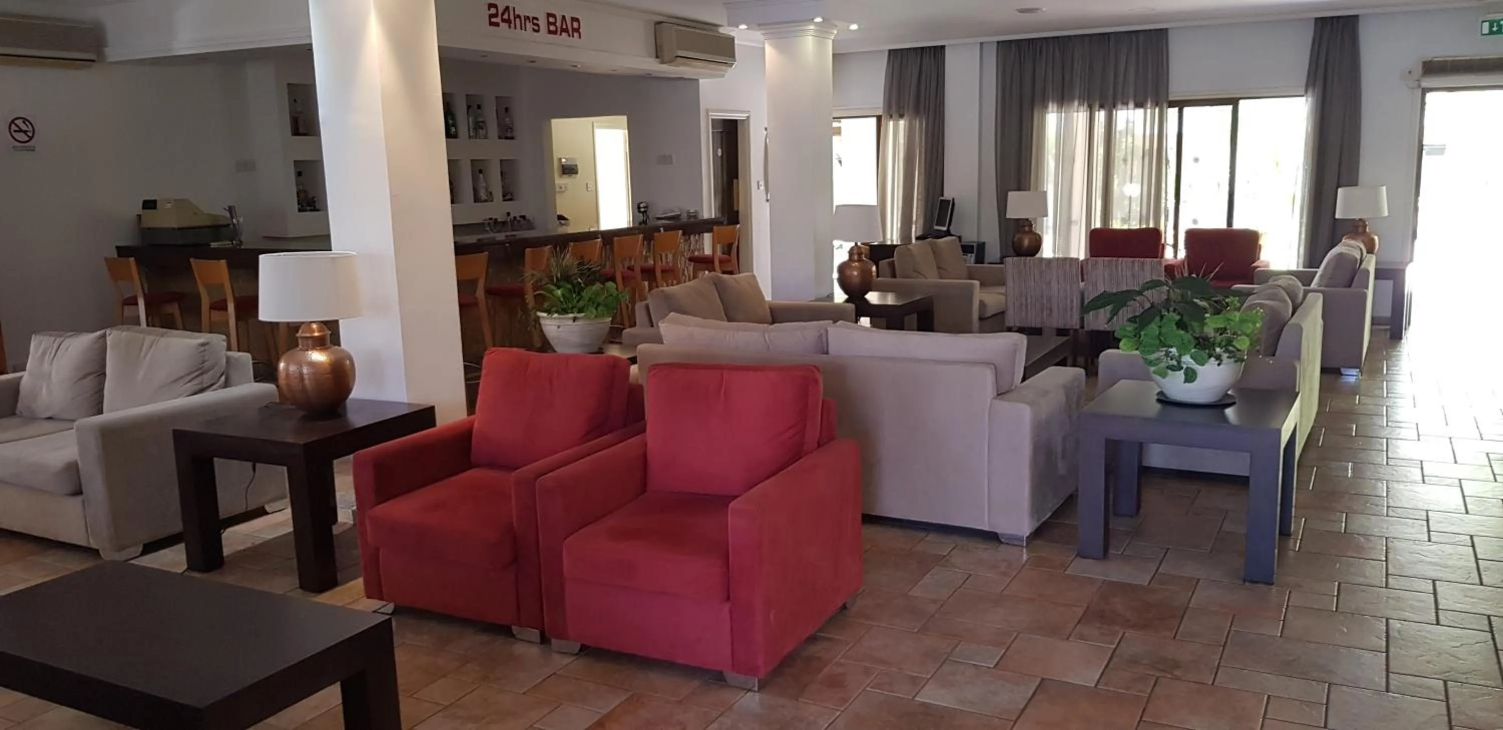Lounge or bar in Helios Bay Hotel and Suites