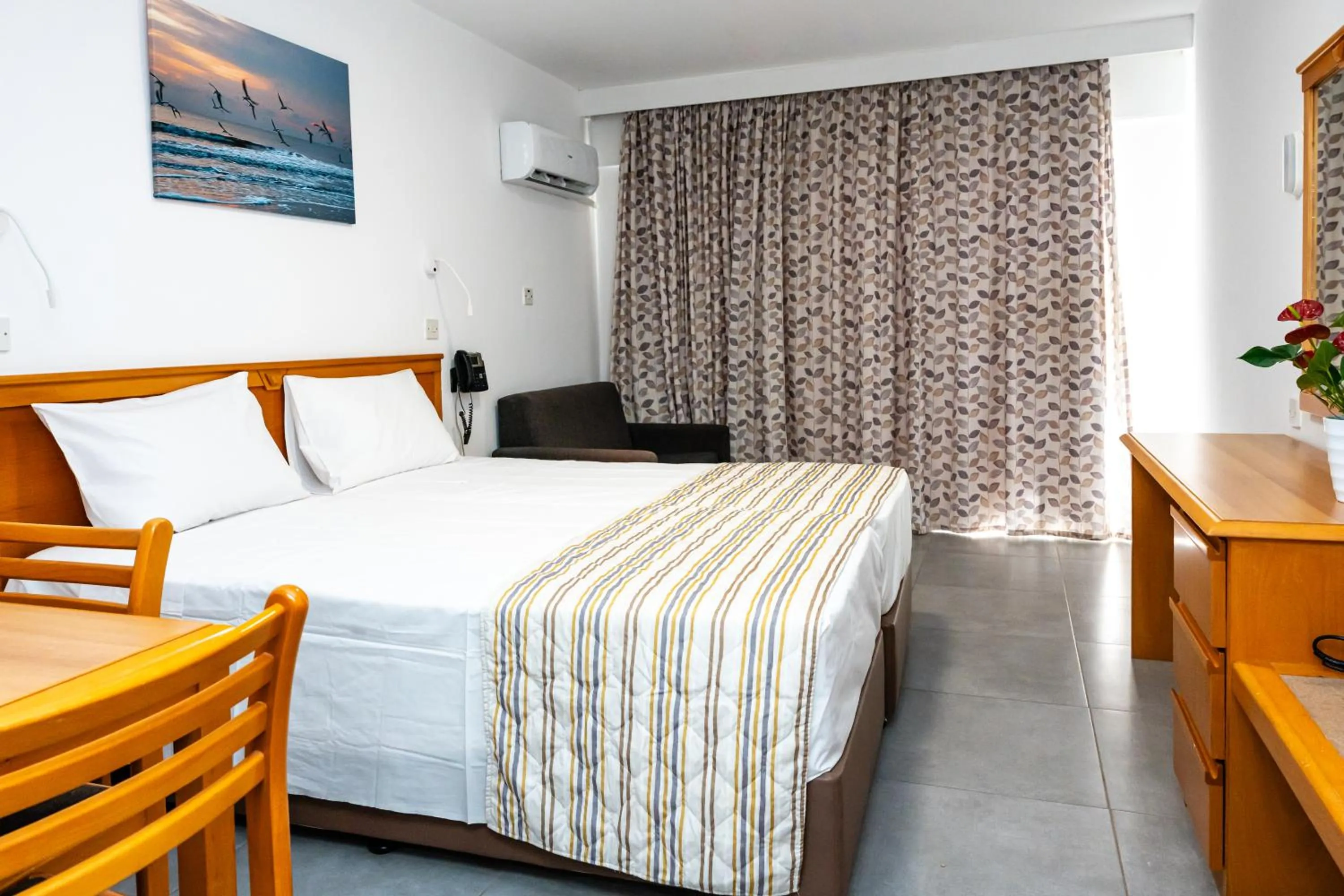 Bedroom, Bed in Helios Bay Hotel and Suites