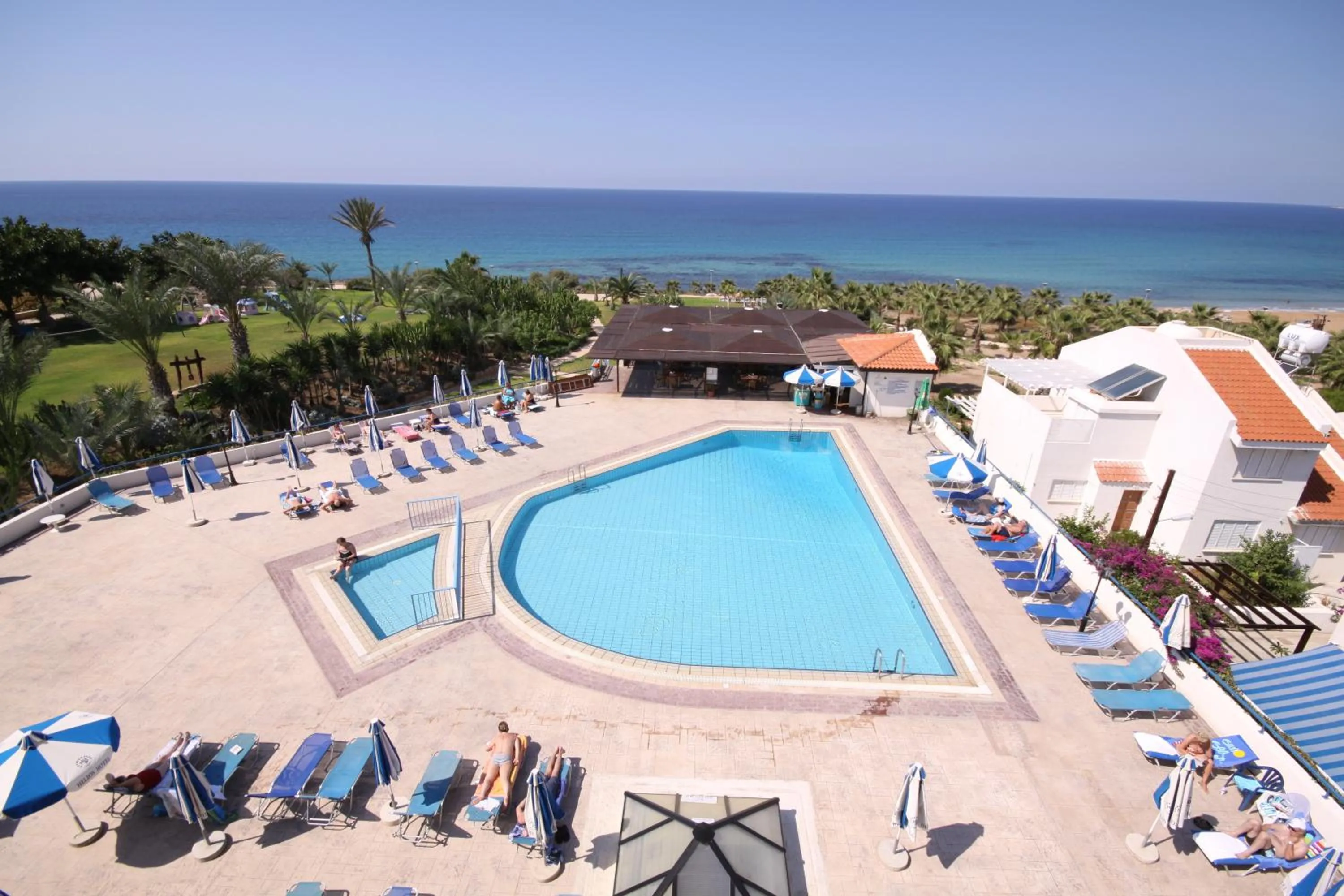 Swimming pool in Helios Bay Hotel and Suites