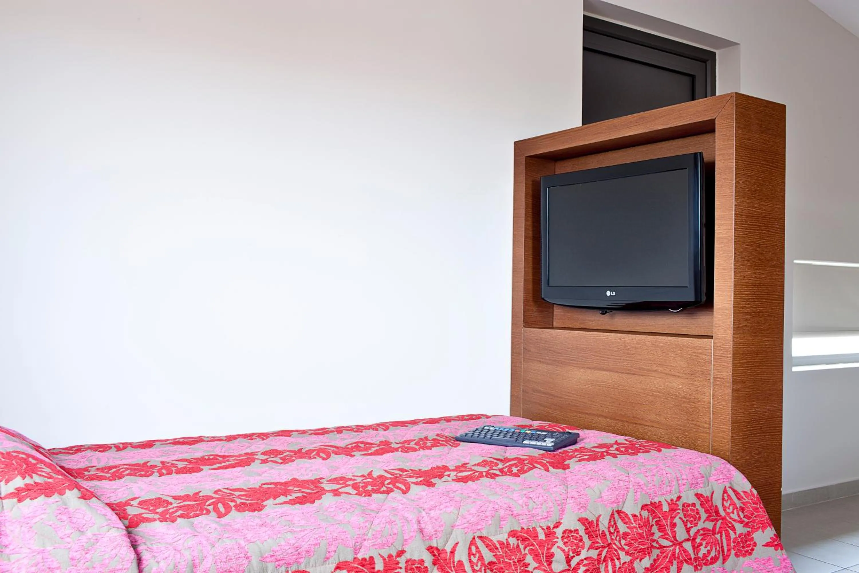 Bed in Apollonion Asterias Resort and Spa