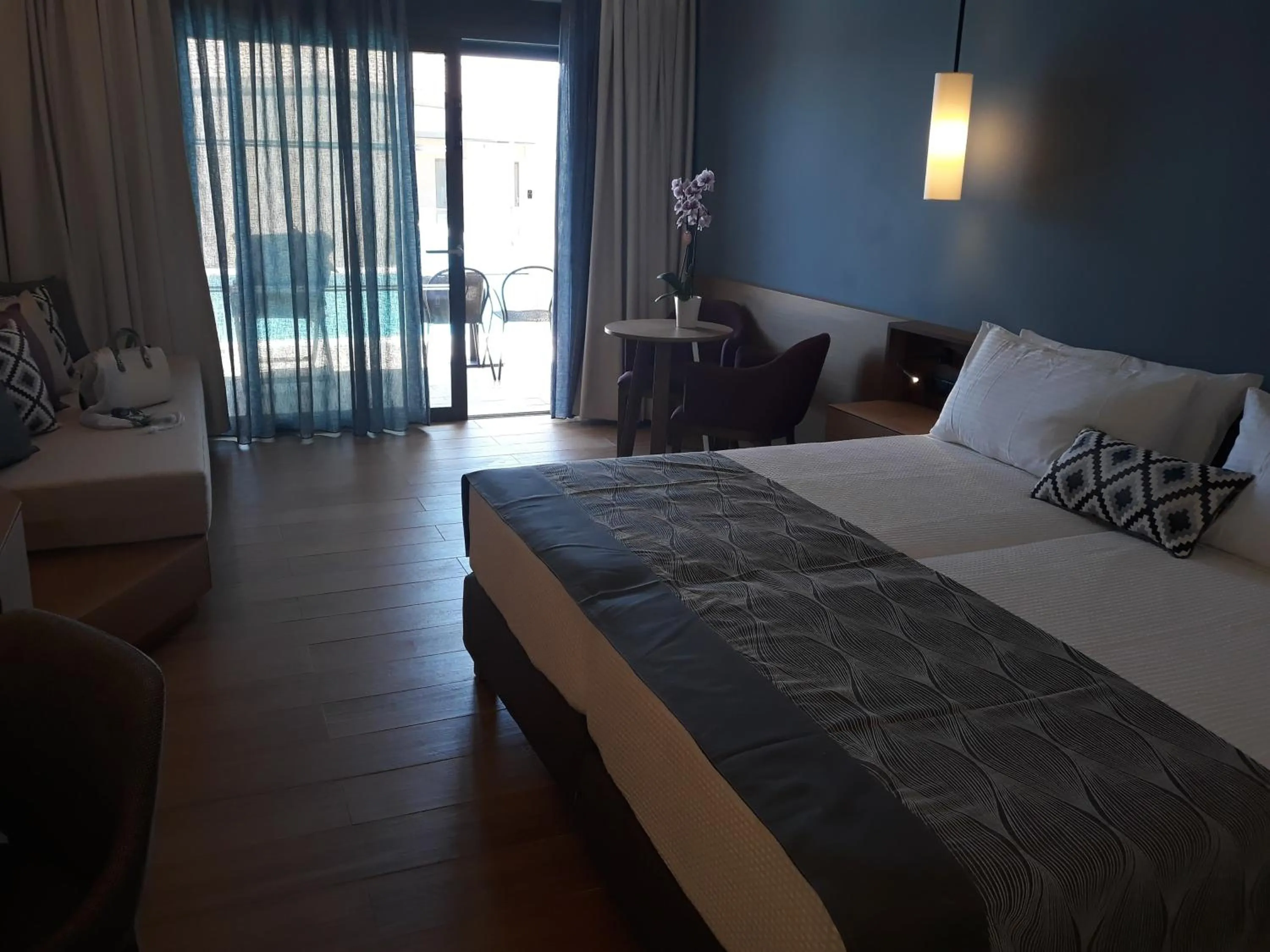 Bedroom, Bed in Apollonion Asterias Resort and Spa